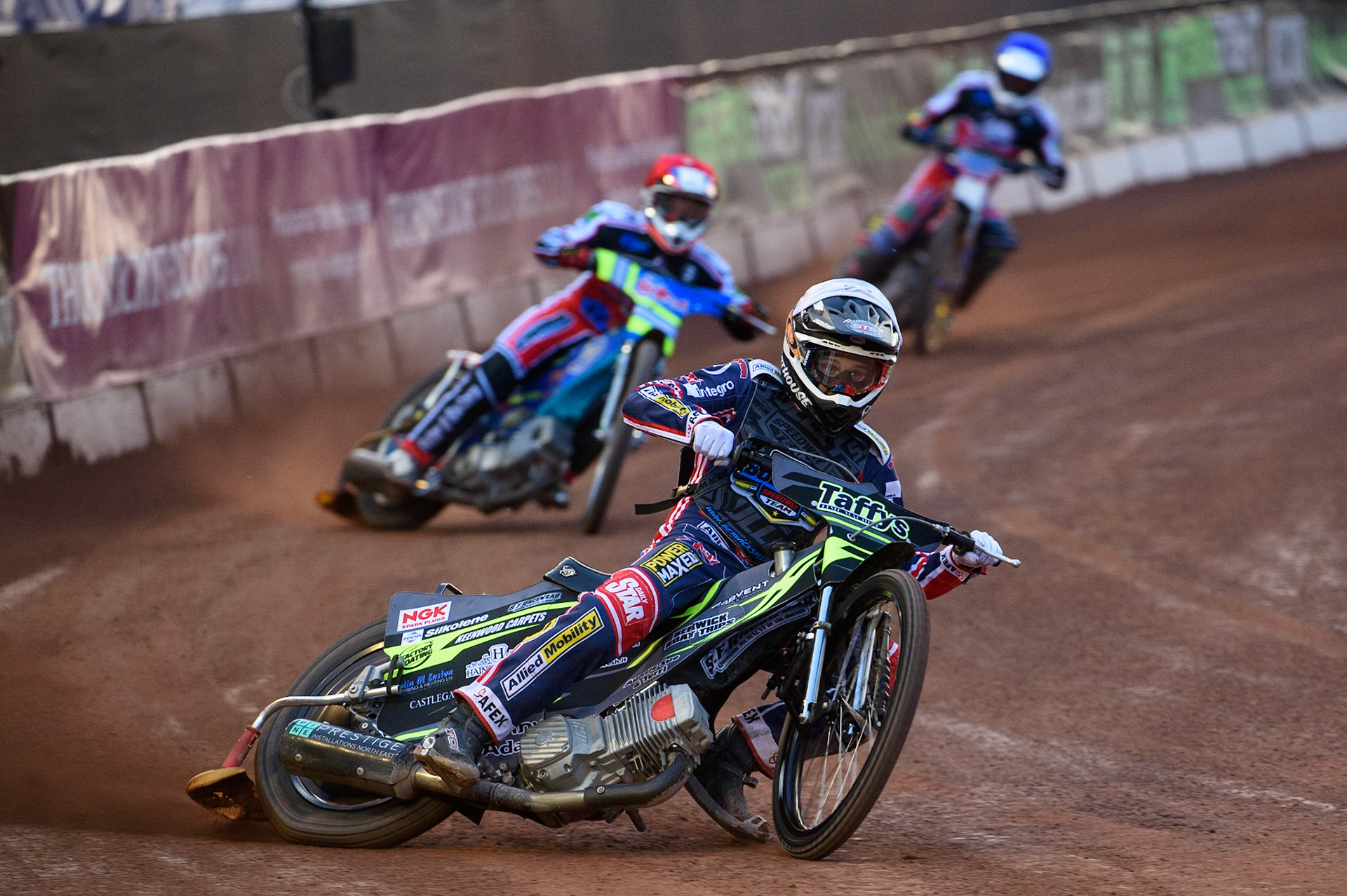 MANCHESTER, UK. MAY 28TH  Leon Flint  leads Benji Compton  (Red) and Paul Bowen  (Blue) during the SGB National Development League match between Belle Vue Colts and Berwick Bullets at the National Speedway Stadium, Manchester on Friday 28th May 2021. (Credit: Ian Charles | MI News)