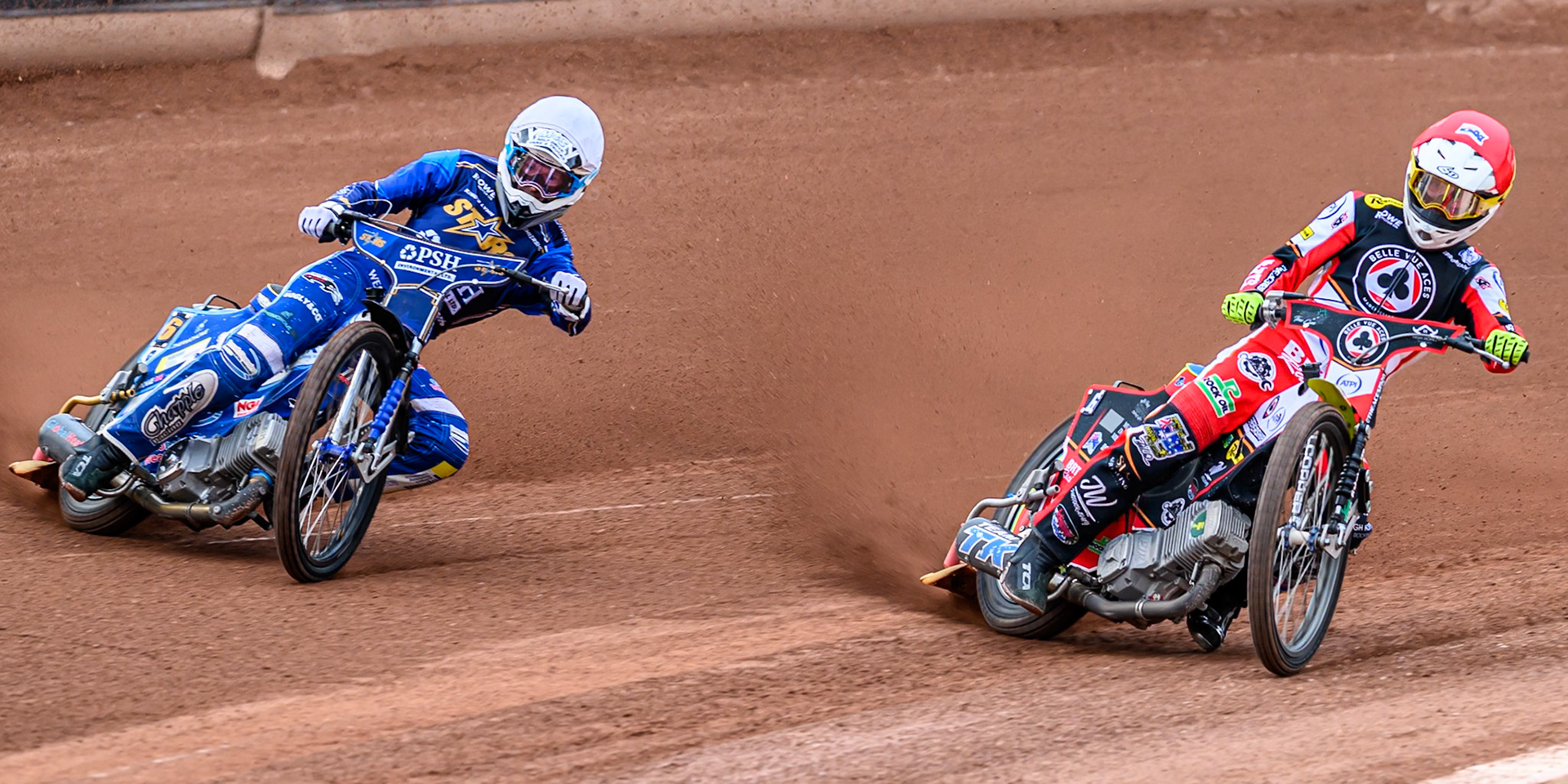 Belle Vue Aces' Tate Zischke in Red rides inside Kings Lynn Stars' Guest Rider, Anders Rowe in White during the Rowe Motor Oil Premiership match between Belle Vue Aces and King's Lynn Stars at the National Speedway Stadium, Manchester on Monday 23rd June 2025. (Photo: Ian Charles | MI News)