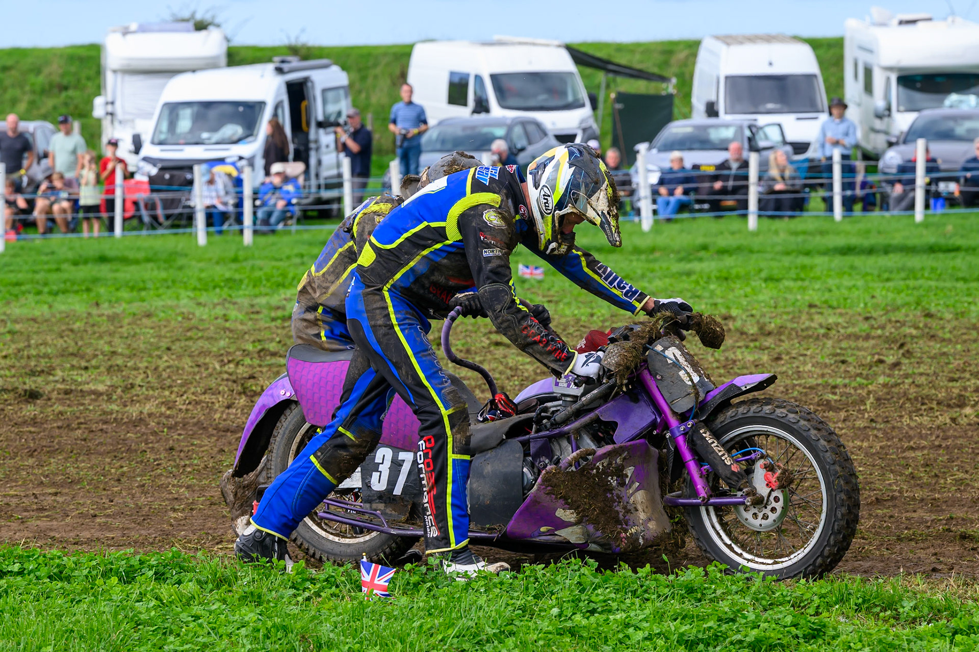 British Masters 1000cc Sidecars: Mark Cossar/Wayne Rickards (37)   push their machine to the finish to score a point after an engine failure on the final turn during the British Masters Grasstrack Championship at Lower Marsh Farm, Much Hoole, Preston in Lancashire, England on Sunday 13th September 2026. (Photo: Ian Charles | MI News)
