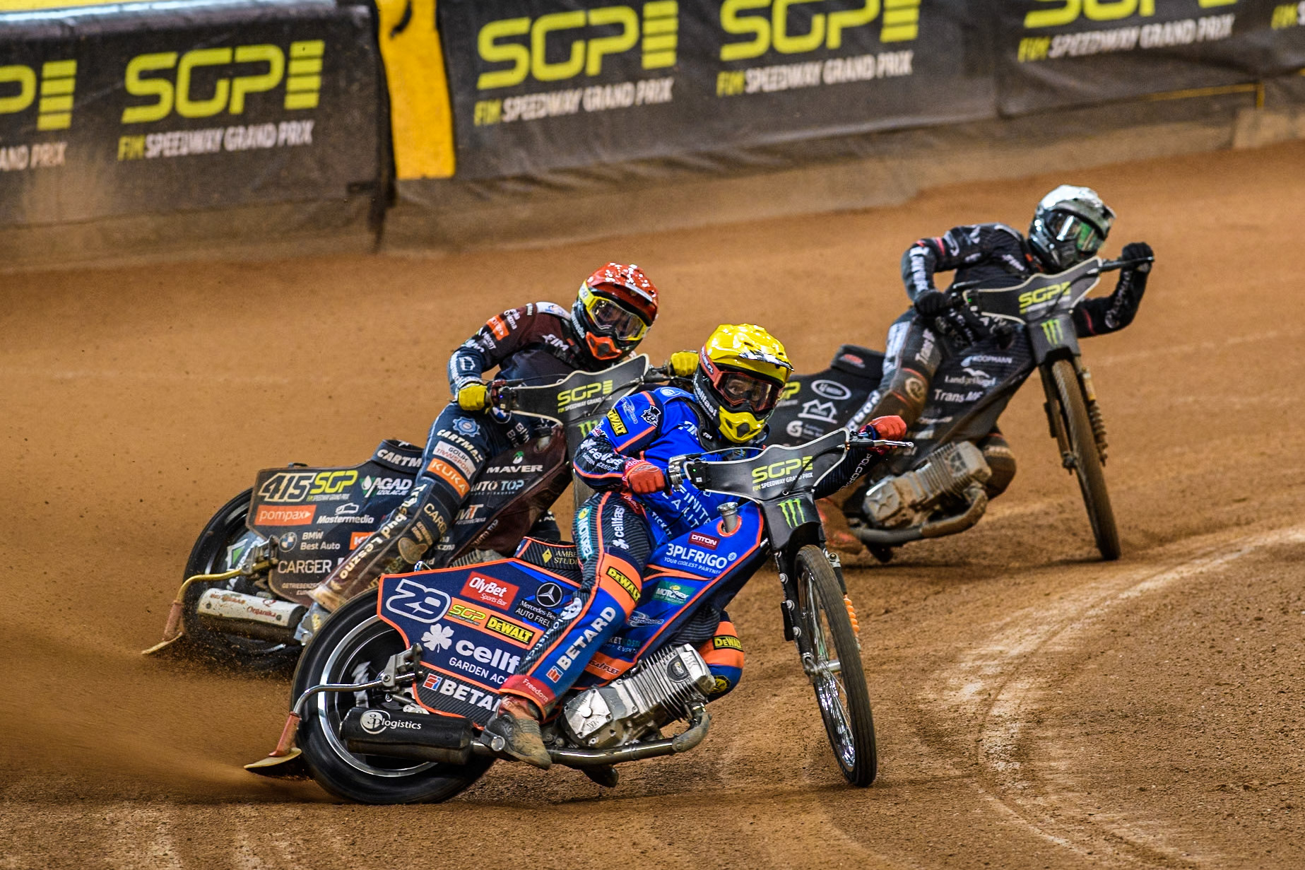 Andzejs Lebedevs (29) of Latvia in Yellow leading Dominik Kubera (415) of Poland in Red and Kai Huckenbeck (744) of Germany in White during the FIM Speedway Grand Prix of Great Britain at The Principality Stadium, Cardiff on Saturday 17th August 2024. (Photo: Ian Charles | MI News)