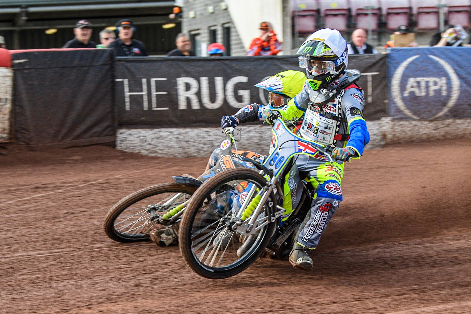 Sonny Springer (White) collides with Billy Budd (Yellow) and causes Budd to fall during the British Youth Speedway Championships at the National Speedway Stadium, Manchester on Friday 21st July 2023. (Photo: Ian Charles | MI News)