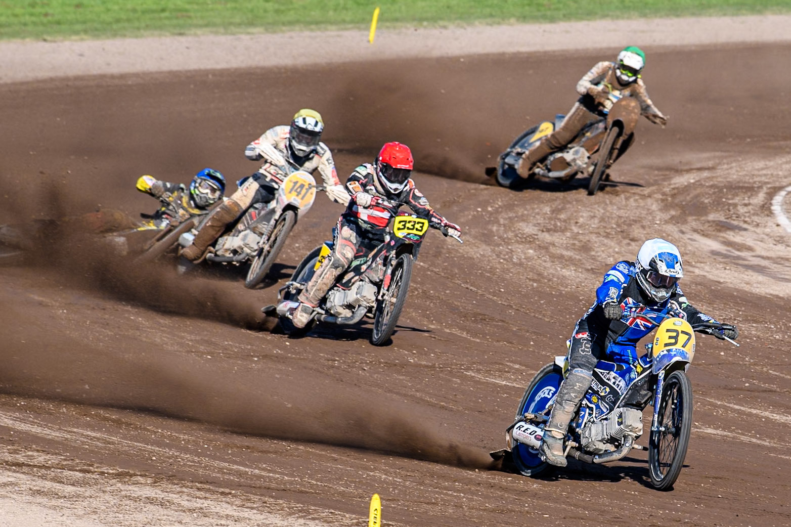 Chris Harris (37)of Great Britain in White leading Kenneth Kruse Hansen (333) of Denmark in Red and Andrew Appleton (141) of Great Britain in Yellow as Mika Meijer (54) of The Netherlands in Blue falls during the FIM Long Track World Championship Final 5 at the Speed Centre Roden, Roden, Netherlands on Sunday 22nd September 2024. (Photo: Ian Charles | MI News)