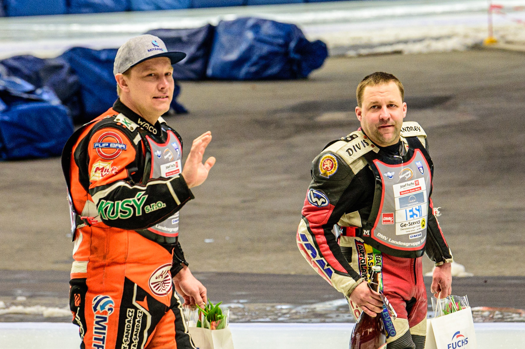 Czech riders on the parade, Lukas Hutla (212) (left) and Andrej Divis (107)  during the Ice Speedway Gladiators World Championship Final 1 at Max-Aicher-Arena, Inzell, Germany on Saturday 18th March 2023. (Photo: Ian Charles | MI News)