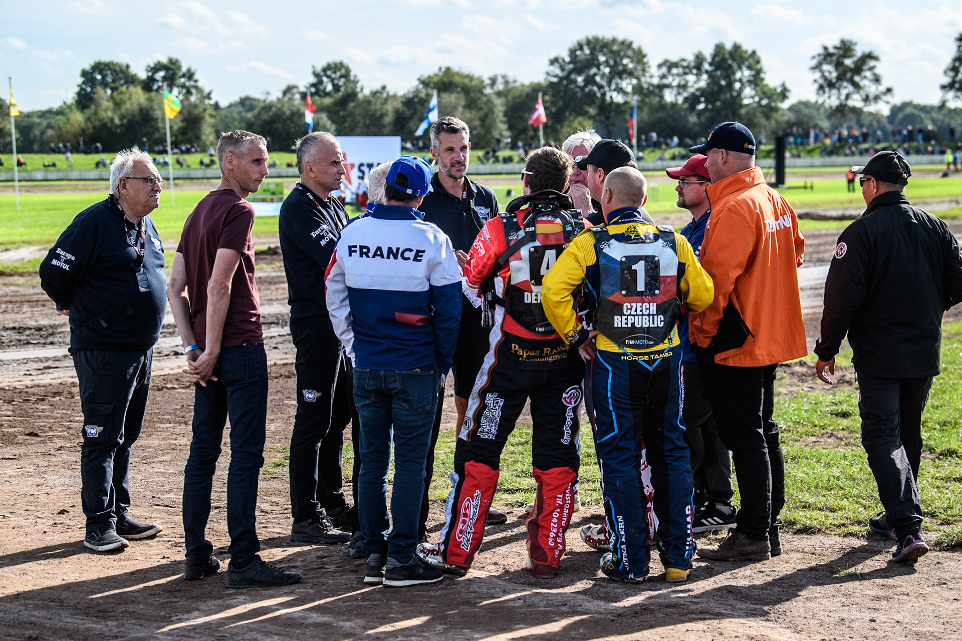 The managers and Captains in a second meeting about the track problems prior to the delay in starting the meeting during the FIM Long Track Of Nations event at the Speed Centre Roden on Sunday 24th September 2023. (Photo: Ian Charles | MI News)
