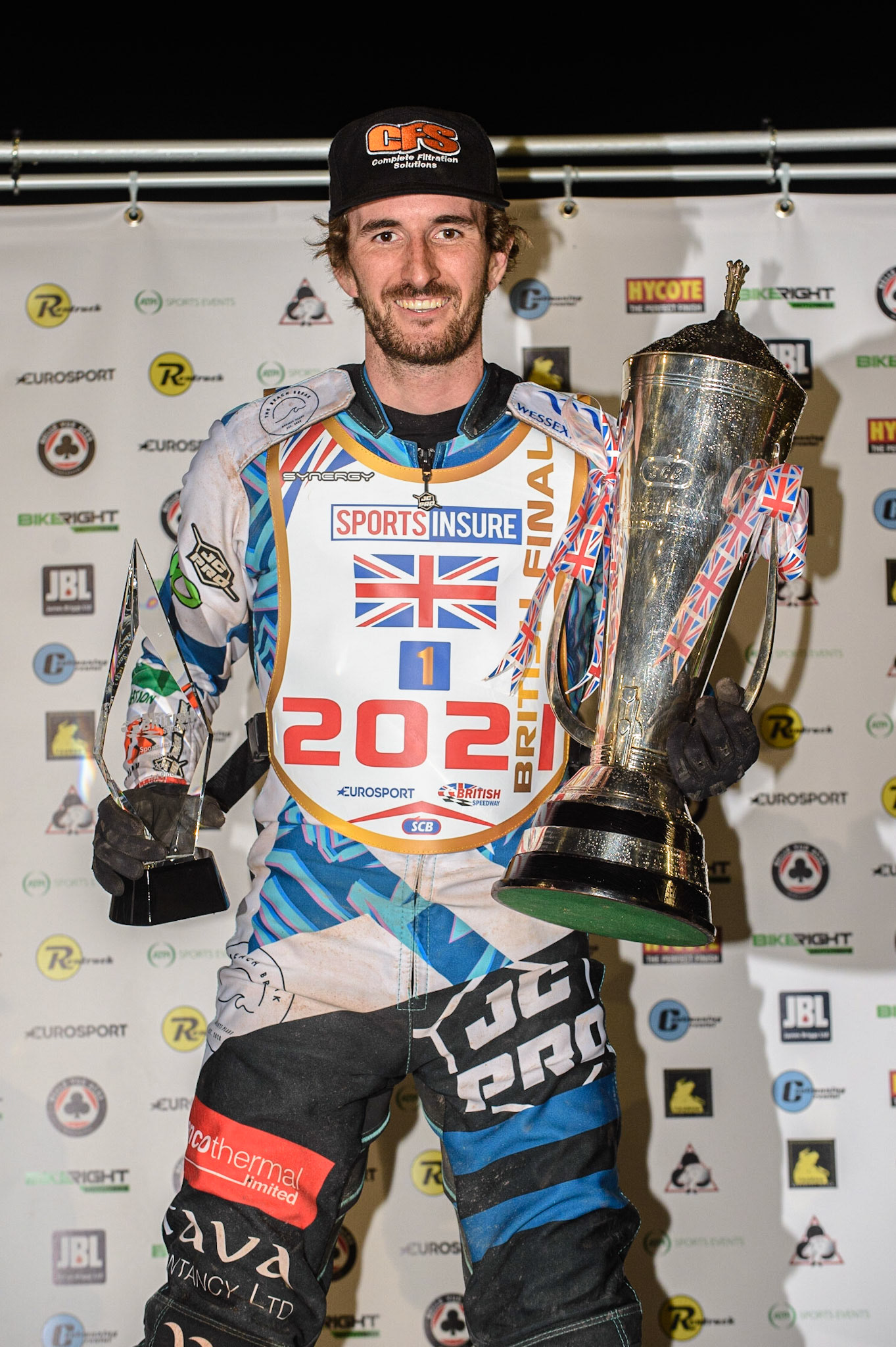 MANCHESTER, UK. AUGUST 16TH   British Champion Adam Ellis with the trophies during the Sports Insure British Speedway Finals at the National Speedway Stadium, Manchester on Monday 16th August 2021. (Credit: Ian Charles | MI News)