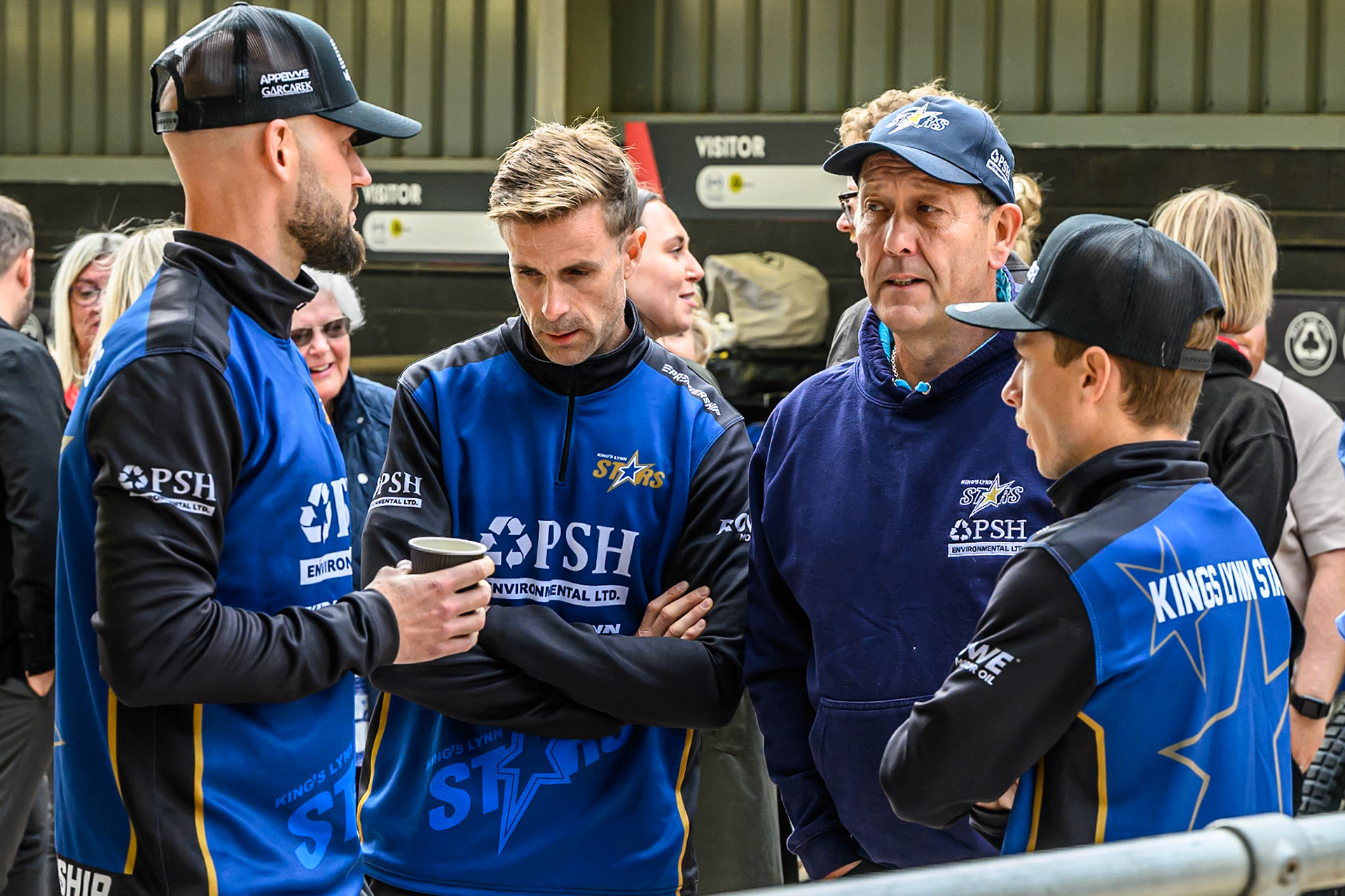 (L to R) Kings Lynn Stars' Nicolai Klindt, Niels-Kristian Iversen, Team Manager Rob Lyon and  Ben Cook during the Rowe Motor Oil Premiership match between Belle Vue Aces and King's Lynn Stars at the National Speedway Stadium, Manchester on Monday 23rd June 2025. (Photo: Ian Charles | MI News)