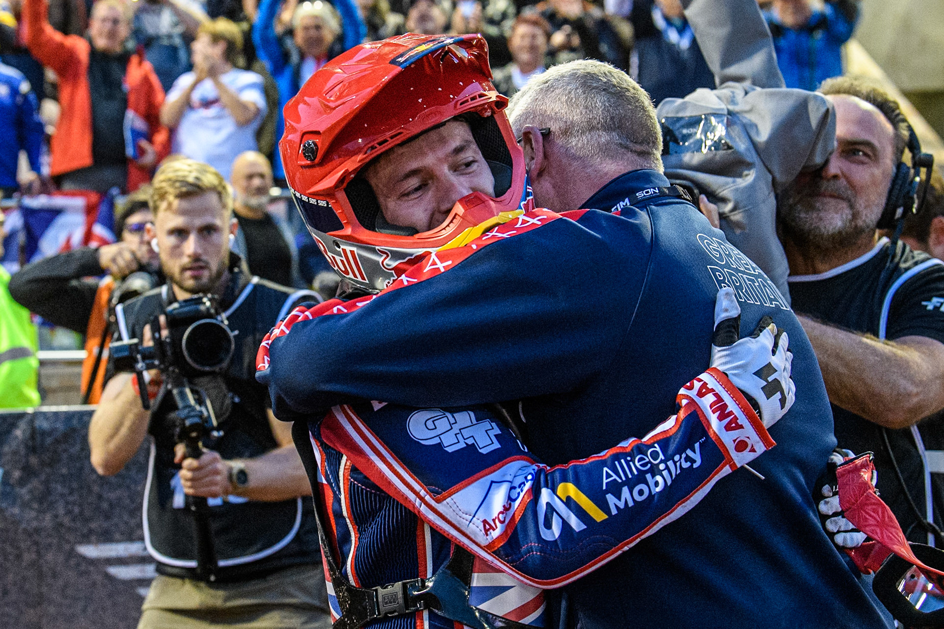 Robert Lambert of Great Britain celebrates with his father after team GB win the Speedway of Nations during the Monster Energy FIM Speedway of Nation Final at the National Speedway Stadium, Manchester on Saturday 13th July 2024. (Photo: Ian Charles | MI News)