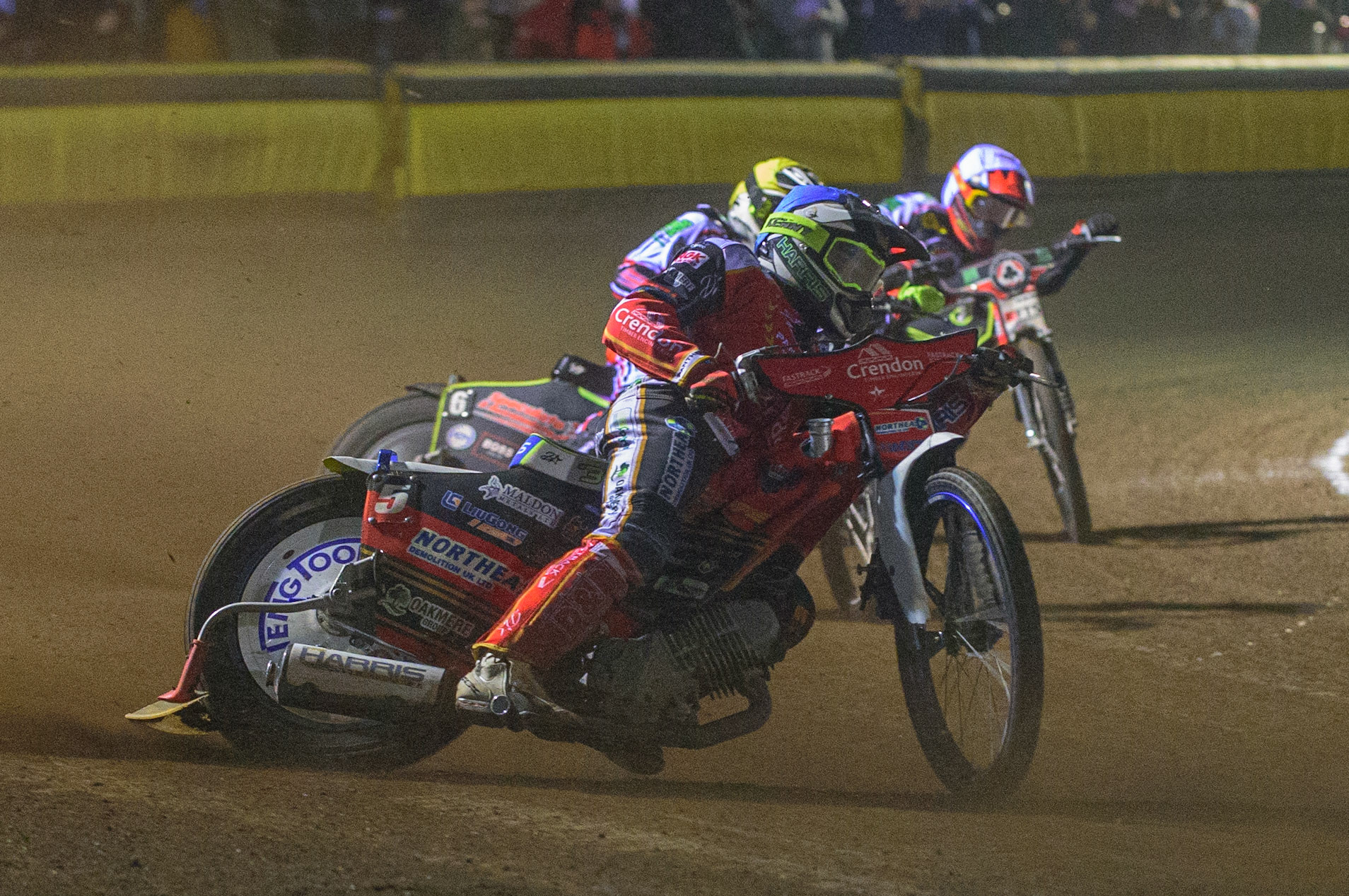 PETERBOROUGH, UK. OCT 14TH Chris Harris  (Blue) leads Tom Brennan  (Yellow) and Jye Etheridge  (White) during the SGB Premiership Grand Final 2nd leg between Peterborough and Belle Vue Aces at East of England Showground, Peterborough on Thursday 14th October 2021. (Credit: Ian Charles | MI News)