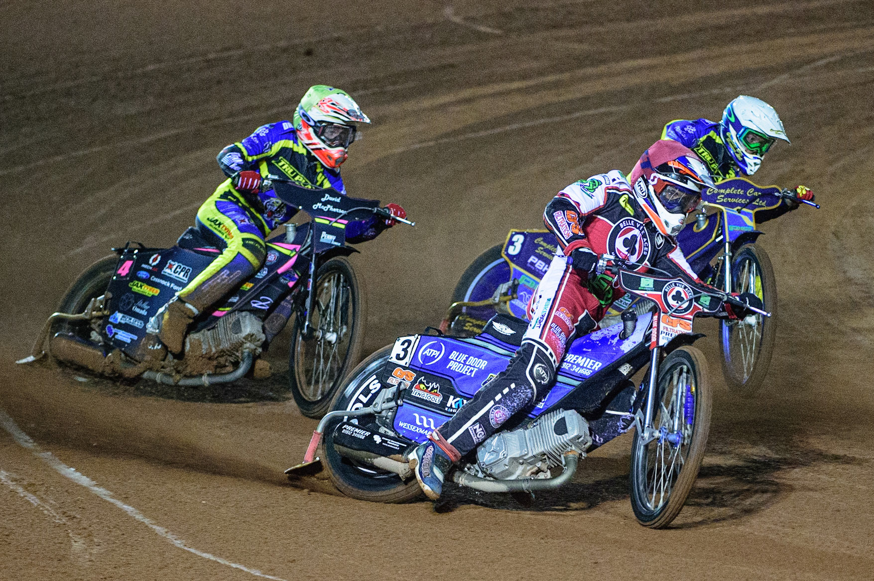 MANCHESTER, UK. OCT 7TH  Steve Worrall   (Red) leads Josh Pickering   (Yellow) and Kyle Howarth  (White) during the SGB Premiership Play off Semi-Final Second Leg between Belle Vue Aces and Sheffield Tigers at the National Speedway Stadium, Manchester on Thursday 7th October 2021. (Credit: Ian Charles | MI News)