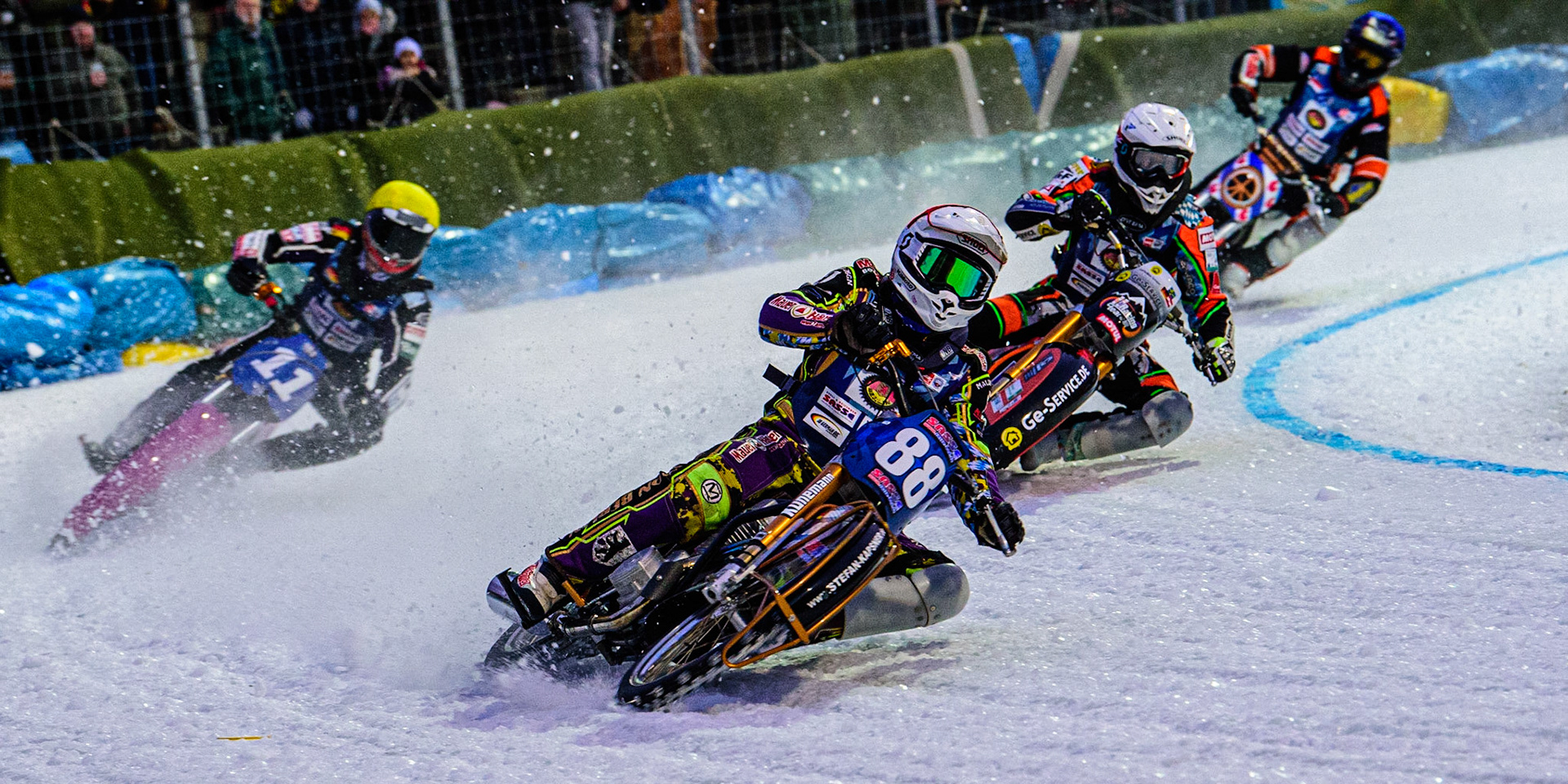 Max Neidermaier (Red) leads Markus Jell (White), Benedikt Monn (Yellow) and Sebastian Reitsma (Blue) during the German Individual Ice Speedway Championship at Horst-Dohm-Eisstadion, Berlin on Friday 3rd March 2023. (Photo: Ian Charles | MI News)