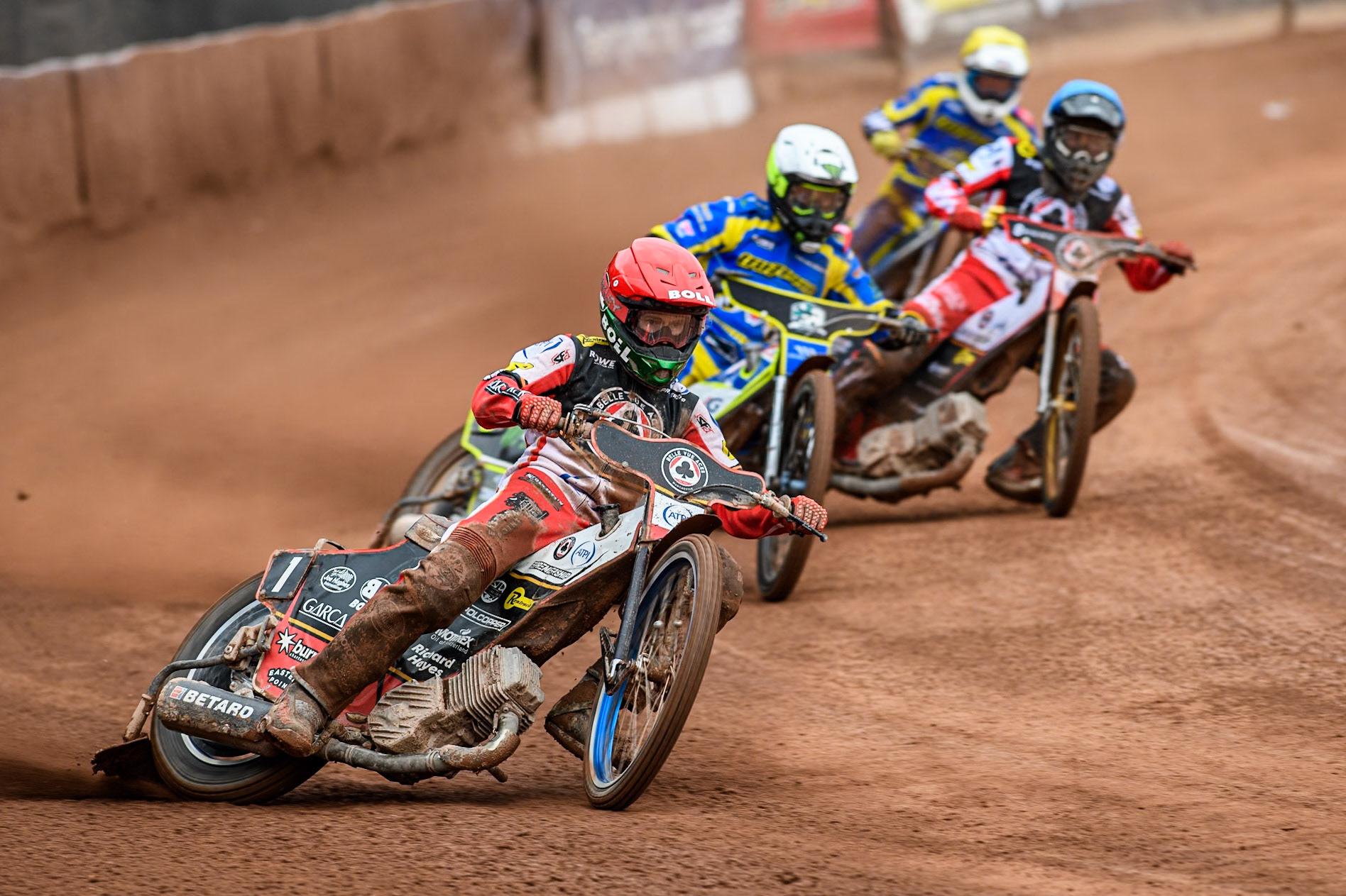 Brady Kurtz of Belle Vue Aces in Red leading Chris Holder of Sheffield Tigers in White, Norick Blödorn of Belle Vue Aces in Blue’ and Lewis Kerr of Sheffield Tigers in Yellow during the Rowe Motor Oil Premiership match between Belle Vue Aces and Sheffield Tigers at the National Speedway Stadium, Manchester on Monday 5th May 2025. (Photo: Ian Charles | MI News)