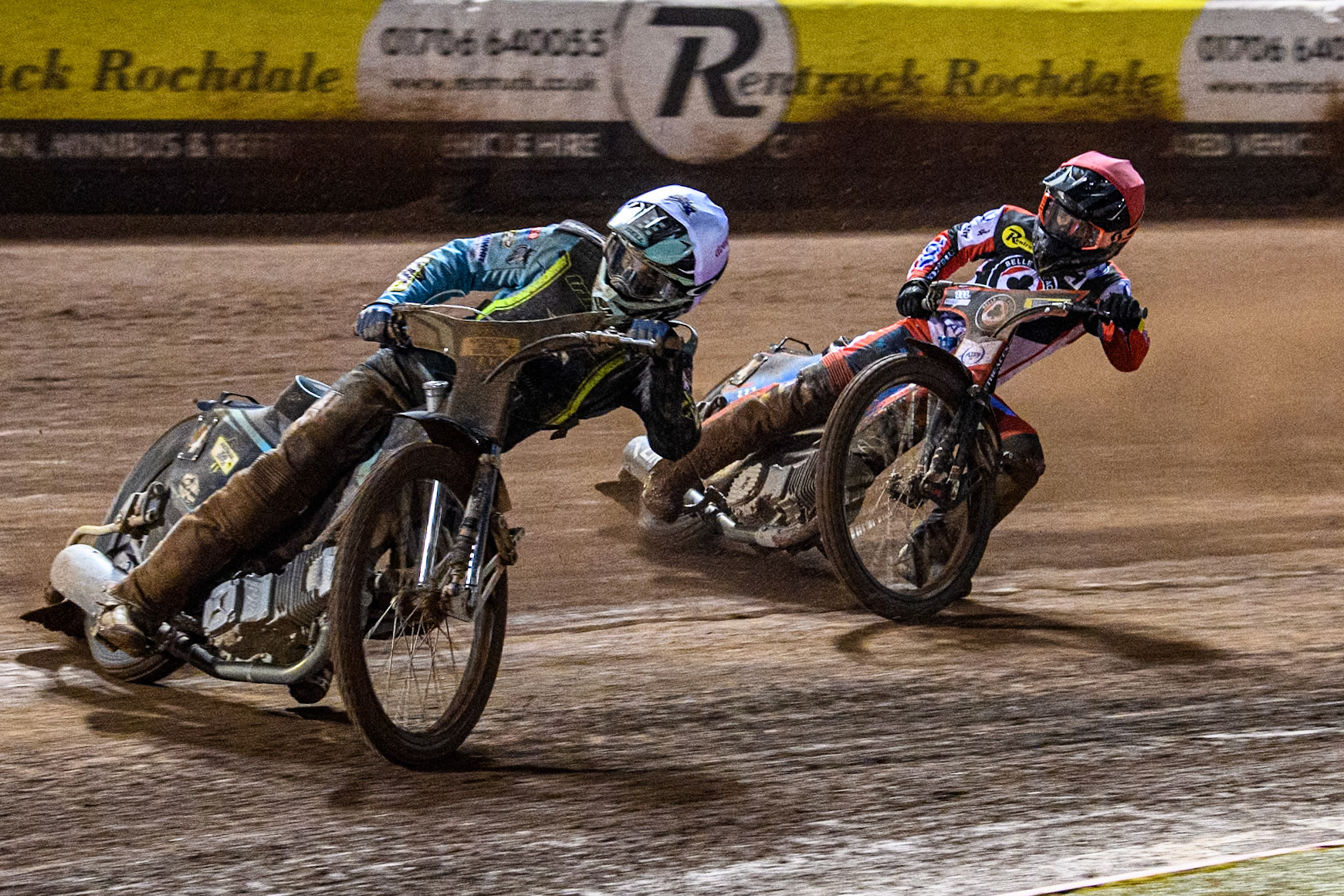 Ipswich Witches' Guest Ryan Douglas in White leading Belle Vue Aces' Ben Cook during the Rowe Motor Oil Premiership match between Belle Vue Aces and Ipswich Witches at the National Speedway Stadium, Manchester on Monday 22nd April 2024. (Photo: Ian Charles | MI News)