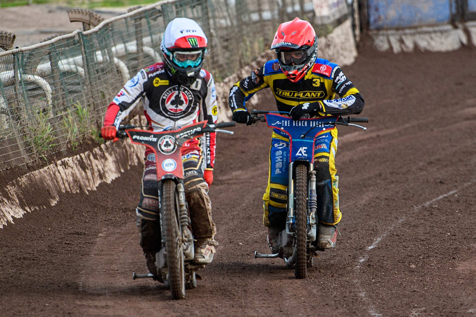 Dan Bewley (White) and Adam Ellis (Red) ride back to the pits during the Sports Insure Premiership match between Sheffield Tigers and Belle Vue Aces at Owlerton Stadium, Sheffield on Thursday 20th July 2023. (Photo: Ian Charles | MI News)