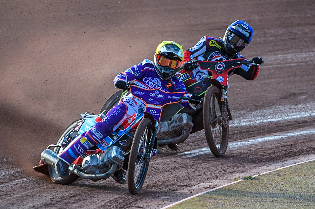 Ben Cook (Yellow) leads Tom Brennan (Blue) during the Sports Insure Premiership match between Belle Vue Aces and Peterborough at the National Speedway Stadium, Manchester on Monday 19th June 2023. (Photo: Ian Charles | MI News)