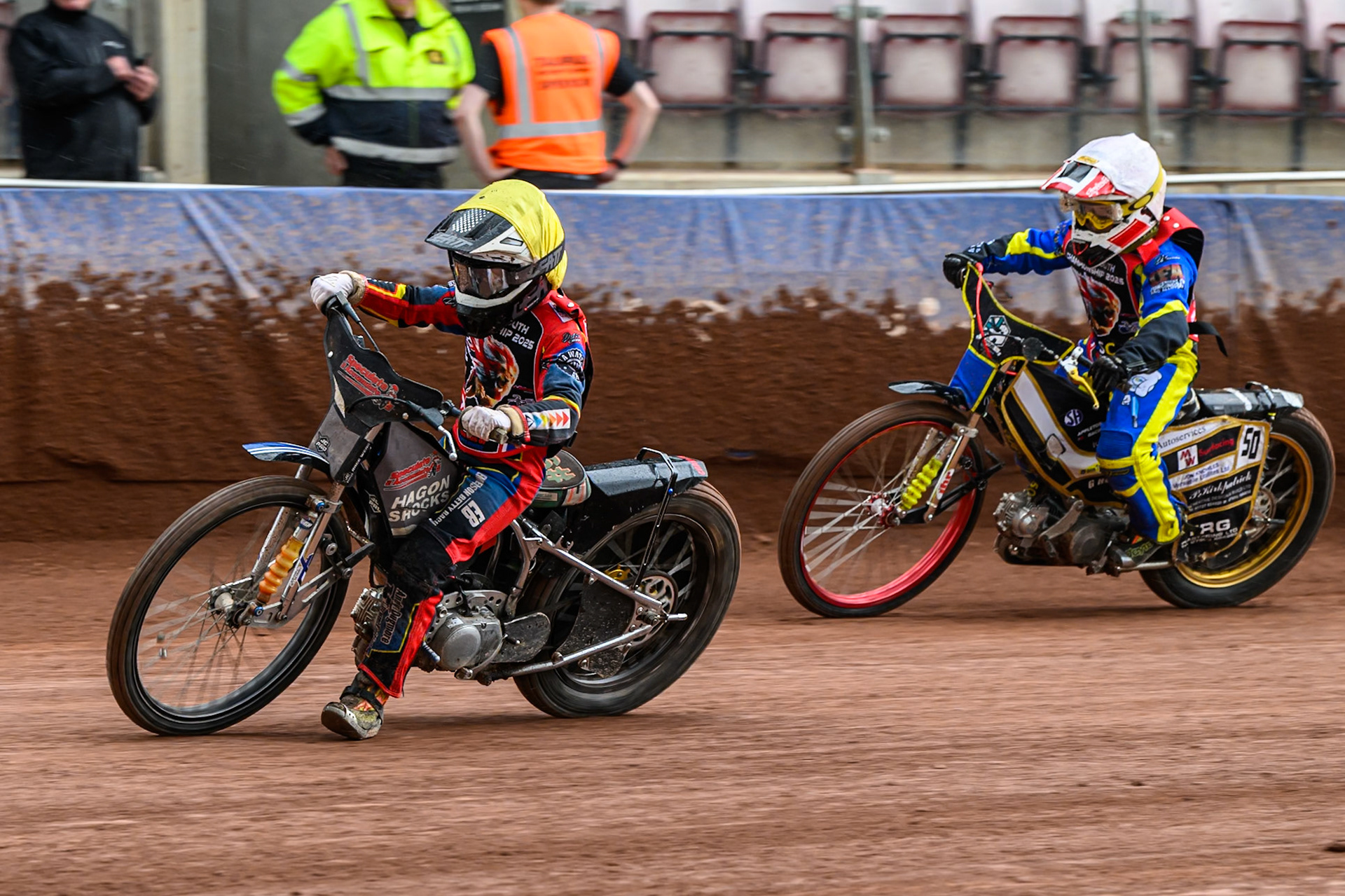 125cc Class Charlie Fletcher (123) in Yellow leading Archie Whitelam (92) in White during the British Youth Championship (125cc) Round 2A, at the National Speedway Stadium, Manchester on Sunday 1st June 2025. (Photo: Ian Charles | MI News)
