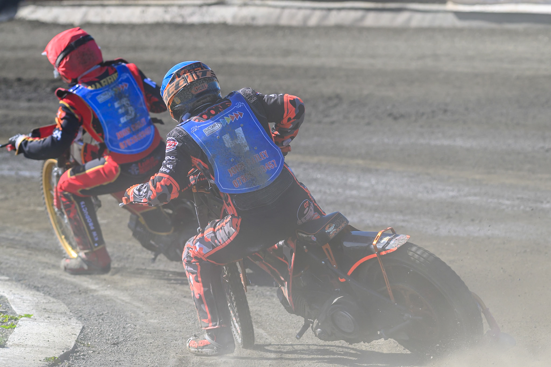 Alex Spooner guest rider for Buxton Bulls in Blue chases Luke Harris of Buxton Bulls  in Red during the National Development League Challenge match between Buxton Bulls and Stoke Potters at Hi-Edge Speedway, Buxton on Sunday 24th May 2026. (Photo: Ian Charles | MI News)