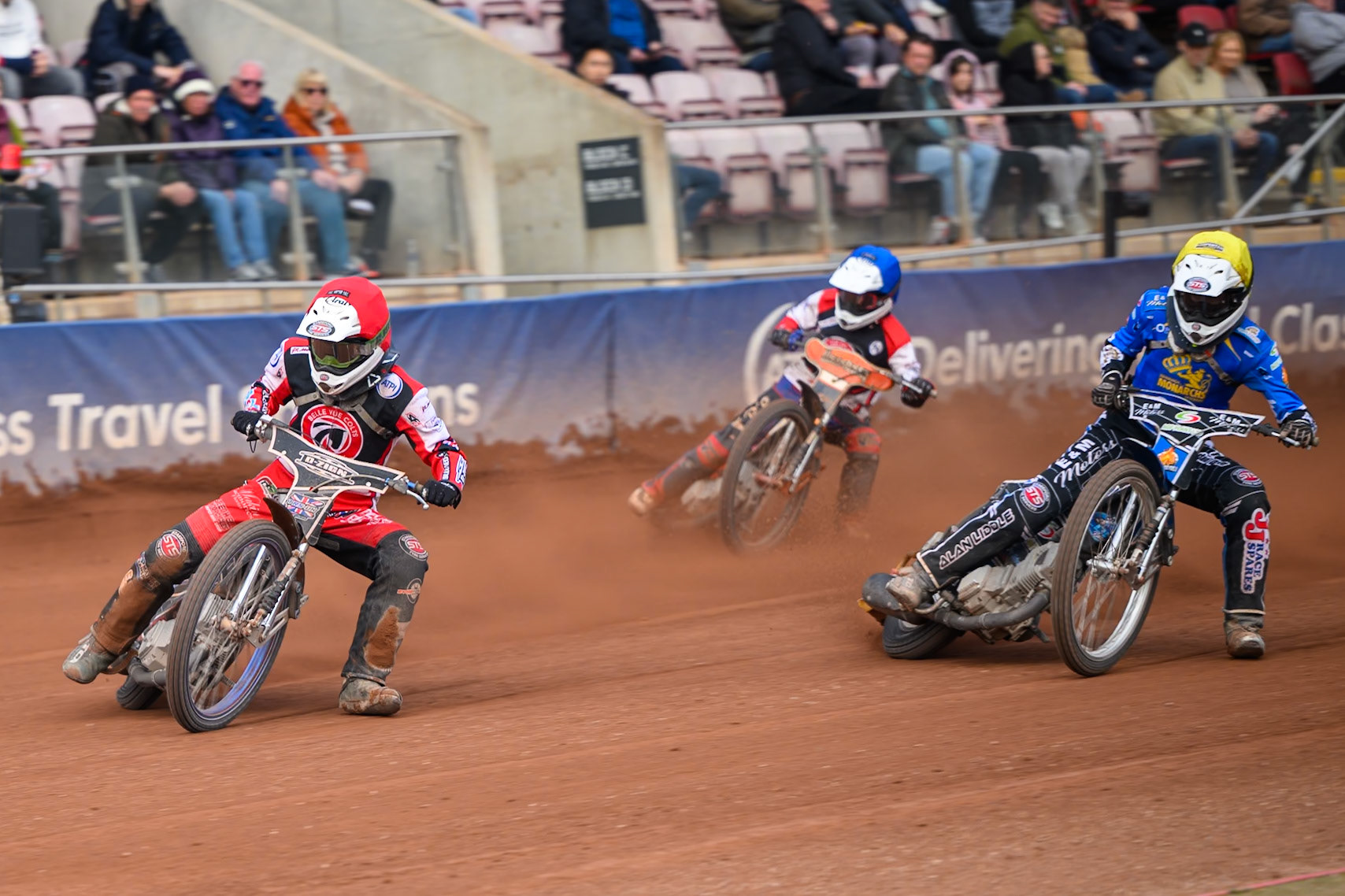 Belle Vue Colts' Jack Shimelt in Red leading Monarchs' Lee Harrison  in Yellow and Belle Vue Colts' Harry Fletcher in Blue during the WSRA National Development League match between Belle Vue Aces and Edinburgh Academy at the National Speedway Stadium, Manchester on Sunday 12th October 2025. (Photo: Ian Charles | MI News)