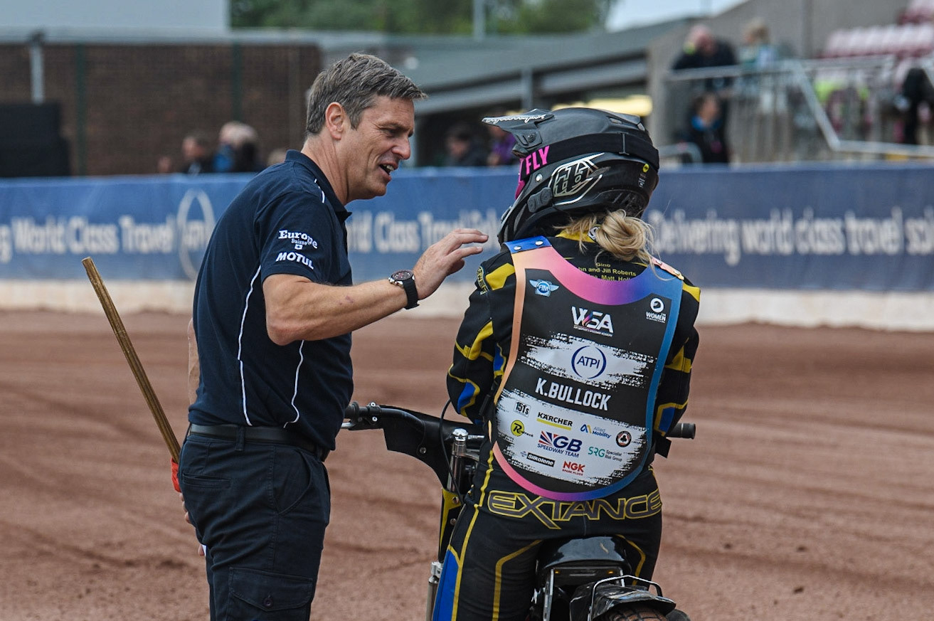 Katy Bullock gets some interaction advice from Phil Morris during the FIM Women's  Speedway Academy at the National Speedway Stadium, Manchester on Friday 4th August 2023. (Photo: Ian Charles | MI News)