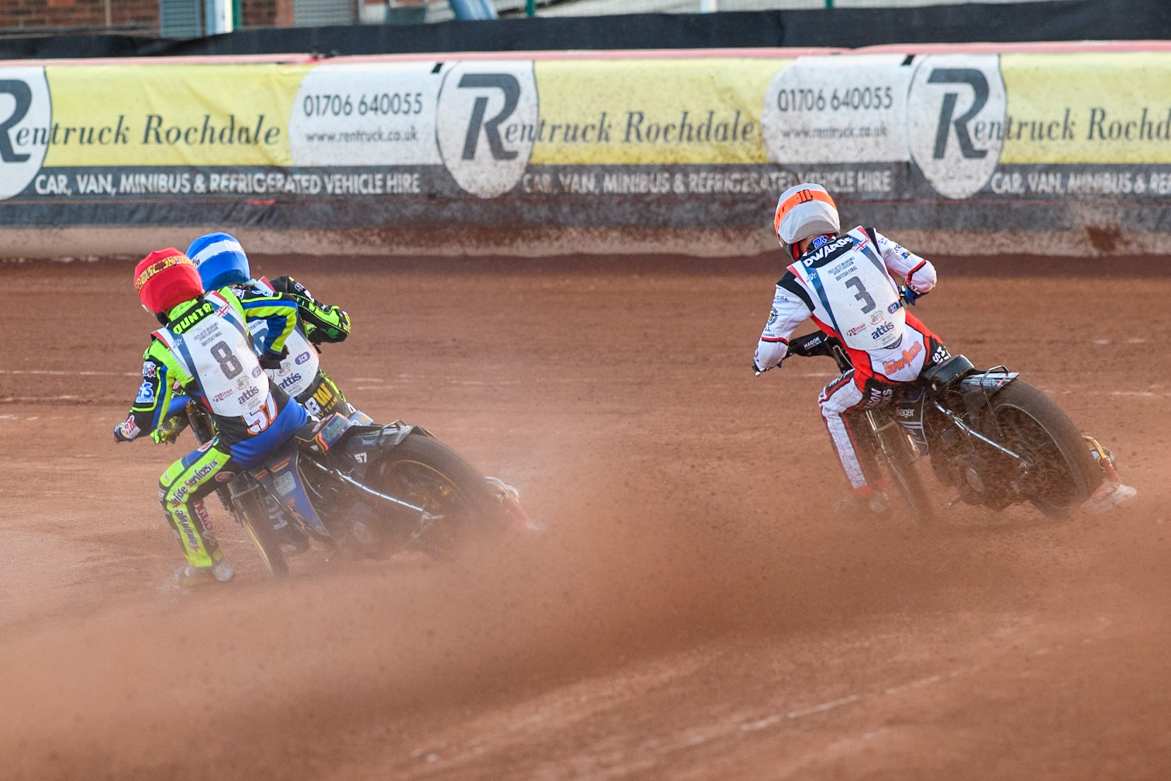 Connor Mountain in Red chases Drew Kemp in Blue with Jason Edwards in White outside during the Attis Insurance Sports Division British Final at the National Speedway Stadium, Manchester on Monday 12th May 2025. (Photo: Ian Charles | MI News)