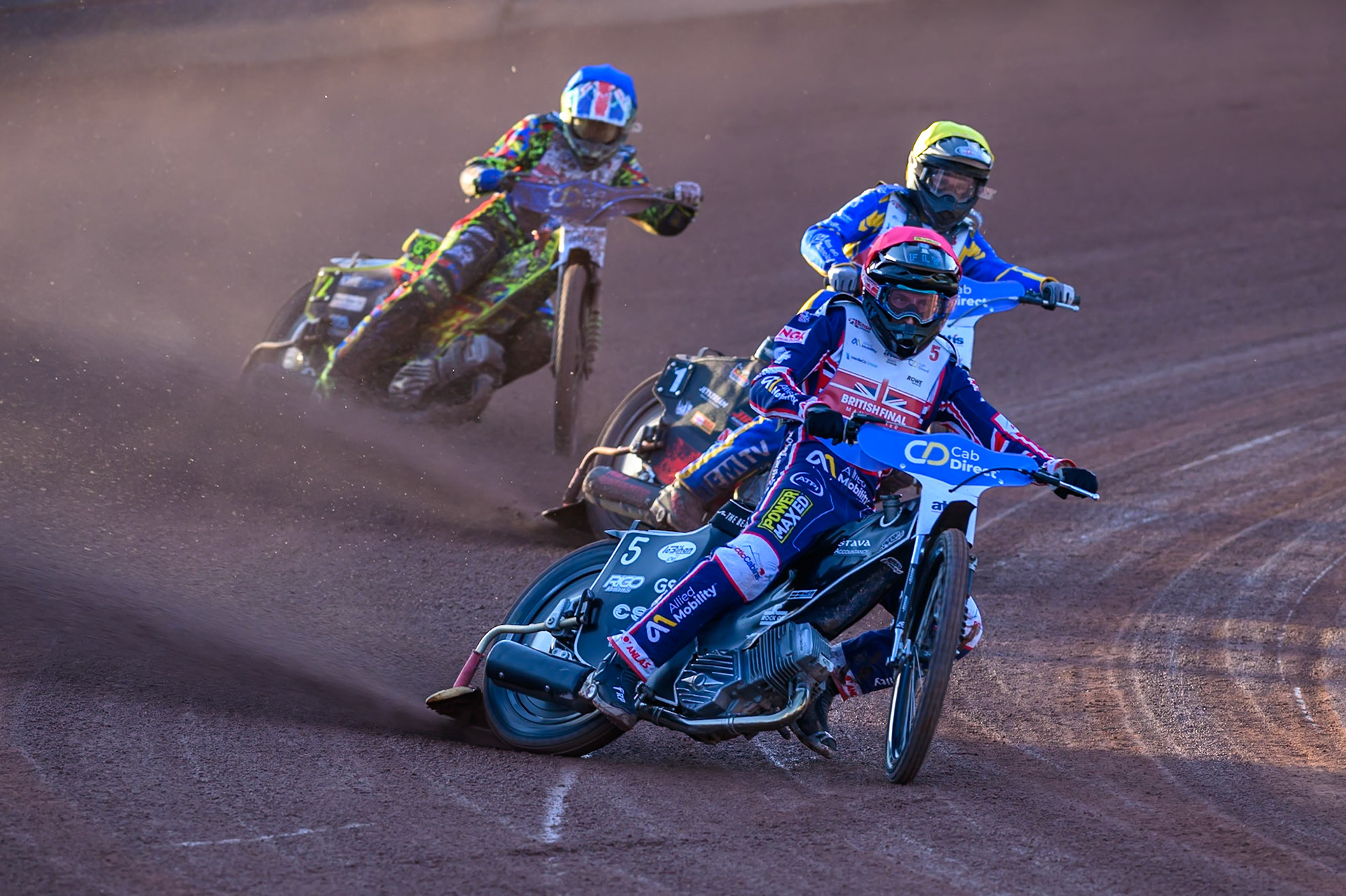 Adam Ellis (5) in Red leading Dan Thompson (8) in Yellow and Will Cairns (7) in Blue during the Cab Direct British Speedway Championship Final at the National Speedway Stadium, Manchester on Saturday 15th August 2026. (Photo: Ian Charles | MI News)
