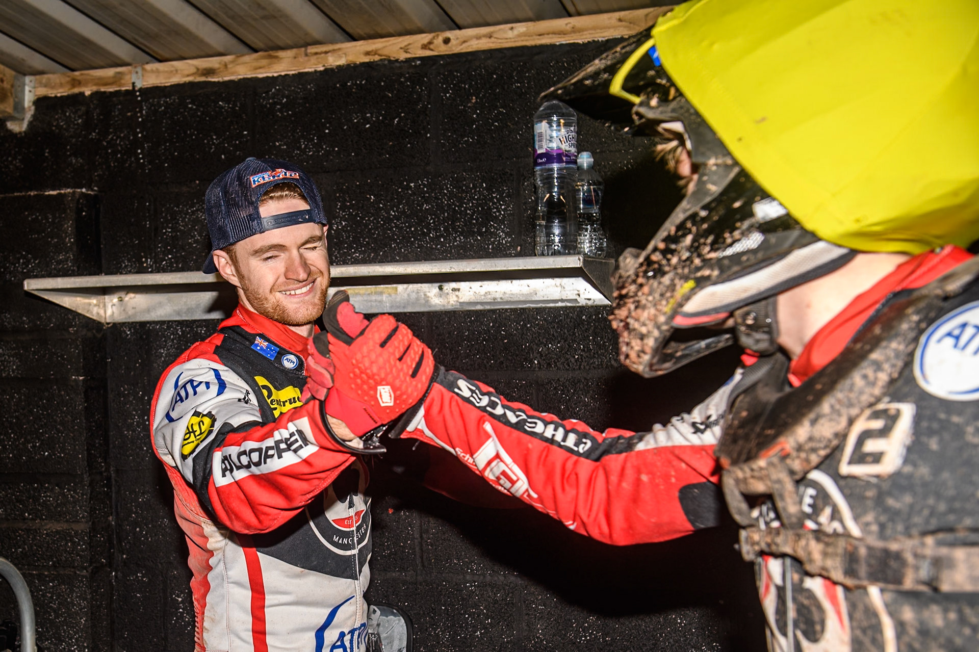 Belle Vue Aces' Brady Kurtz (Left) and Belle Vue Aces' Norick Blodorn celebrate their heat win to take the title during the Rowe Motor Oil Premiership Grand Final 2nd Leg between Leicester Lions and Belle Vue Aces at the Pidcock Motorcycles Arena, Leicester on Thursday 26th September 2024. (Photo: Ian Charles | MI News)