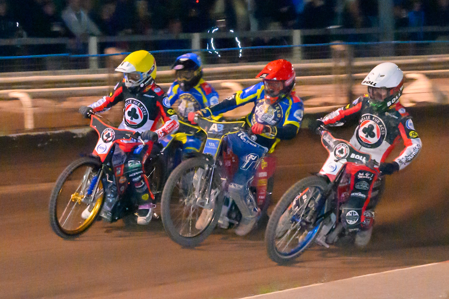 Brady Kurtz of Belle Vue Aces in White Max Fricke, Guest Rider for Sheffield Tigers  in Red  and Jason Doyle of Belle Vue Aces in Yellow  host the first turn with Josh Pickering of Sheffield Tigers in Blue  behind during the Rowe Motor Oil Premiership match between Sheffield Tigers and Belle Vue Aces at Owlerton Stadium, Sheffield on Monday 31st August 2026. (Photo: Ian Charles | MI News)