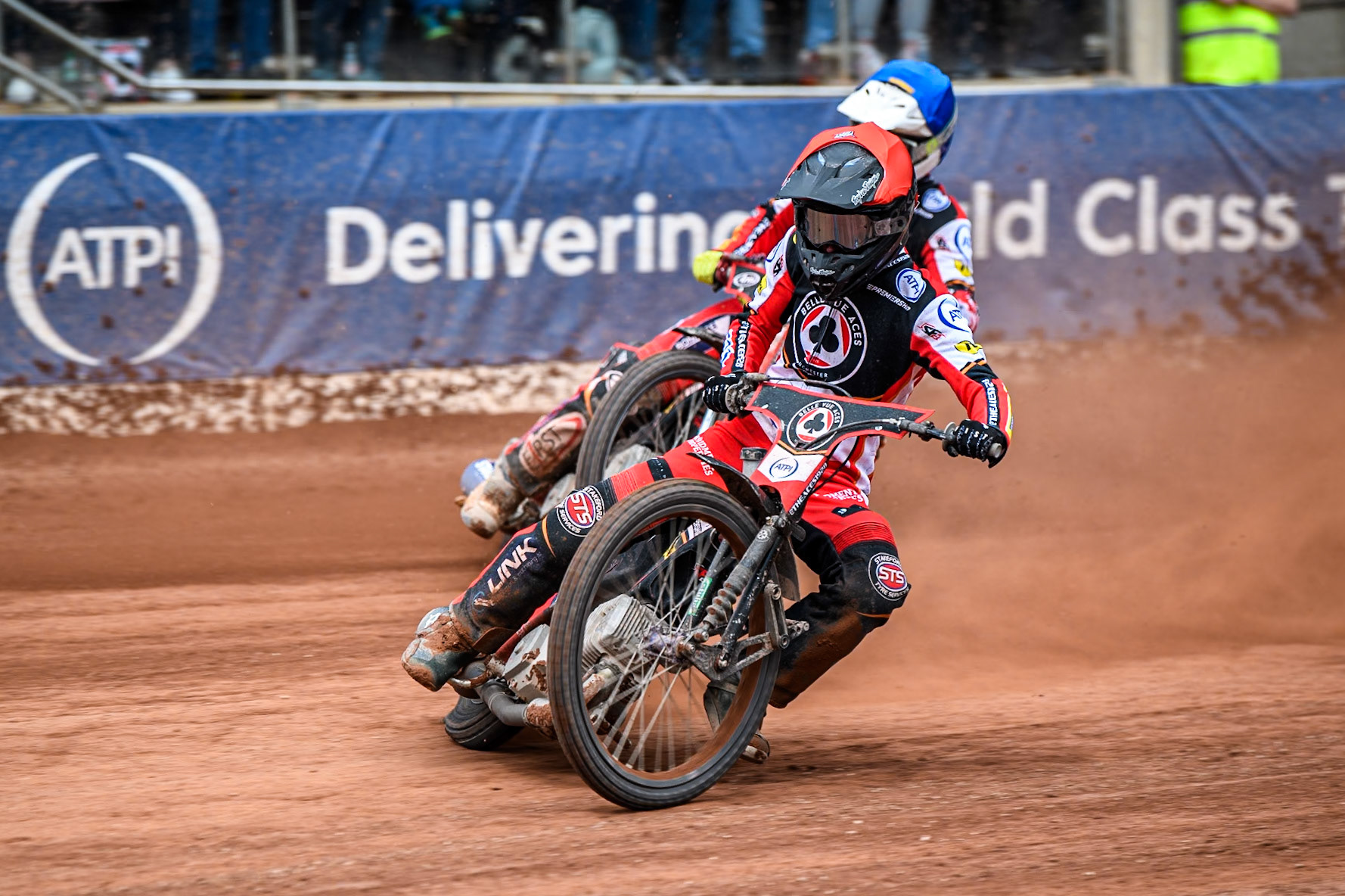 Zach Cook of Belle Vue Aces in Red leading Jake Mulford of Belle Vue Aces in Blue during the Rowe Motor Oil Premiership match between Belle Vue Aces and Sheffield Tigers at the National Speedway Stadium, Manchester on Monday 5th May 2025. (Photo: Ian Charles | MI News)