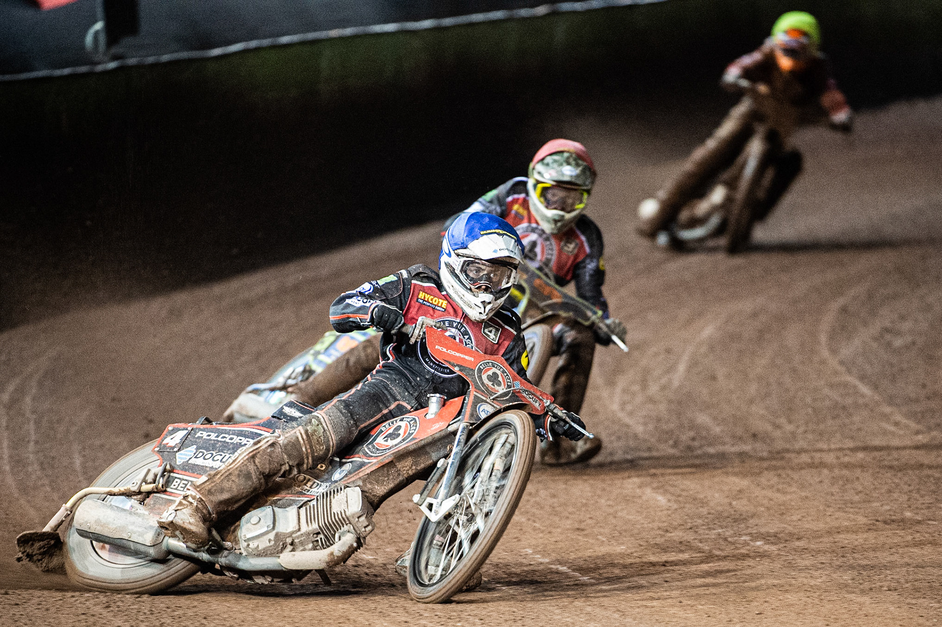 Photo by Ian Charles:

Belle Vue Aces  Jaimon Lidsey  (Blue) and Dan Bewley  (Red) lead Swindon Robins Ellis Perks (Yellow)

Belle Vue Aces v Swindon Robins, Supporters Cup Final 1st Leg, National Speedway Stadium, Manchester, Thursday, 12, September, 2019
