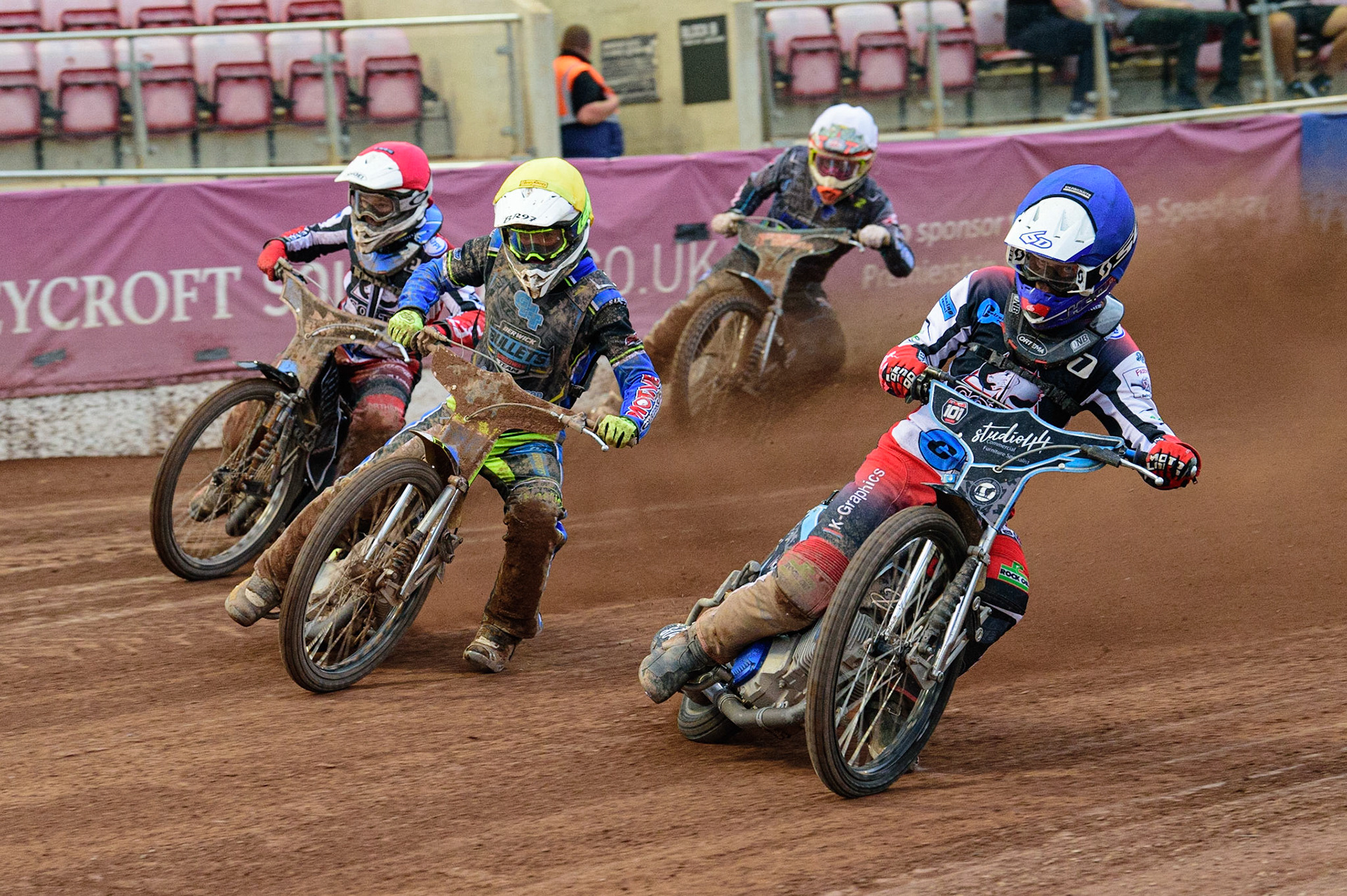 MANCHESTER, UK. JUN 24TH Freddy Hodder  (Blue) leads Ben Rathbone (Yellow) and Sam McGurk  (Red) with Mason Watson  (White) at the rear during the National Development League match between Belle Vue Colts and Berwick Bullets at the National Speedway Stadium, Manchester on Friday 24th June 2022. (Credit: Ian Charles | MI News)