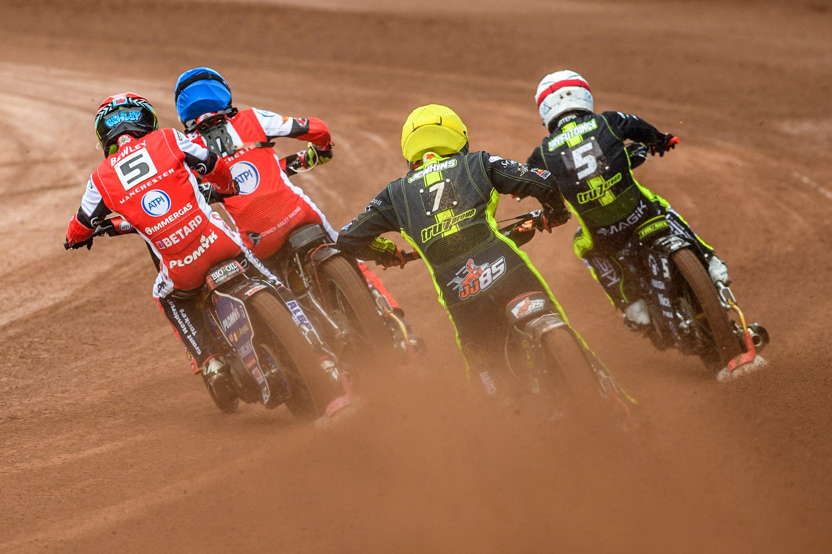 Ipswich Witches' Jordan Jenkins in Yellow chases Ipswich Witches' Emil Sayfutdinov in White Belle Vue Aces' Connor Bailey   in Blue and Belle Vue Aces' Dan Bewley  in Red during the Rowe Motor Oil Premiership match between Belle Vue Aces and Ipswich Witches at the National Speedway Stadium, Manchester on Monday 1st July 2024. (Photo: Ian Charles | MI News)