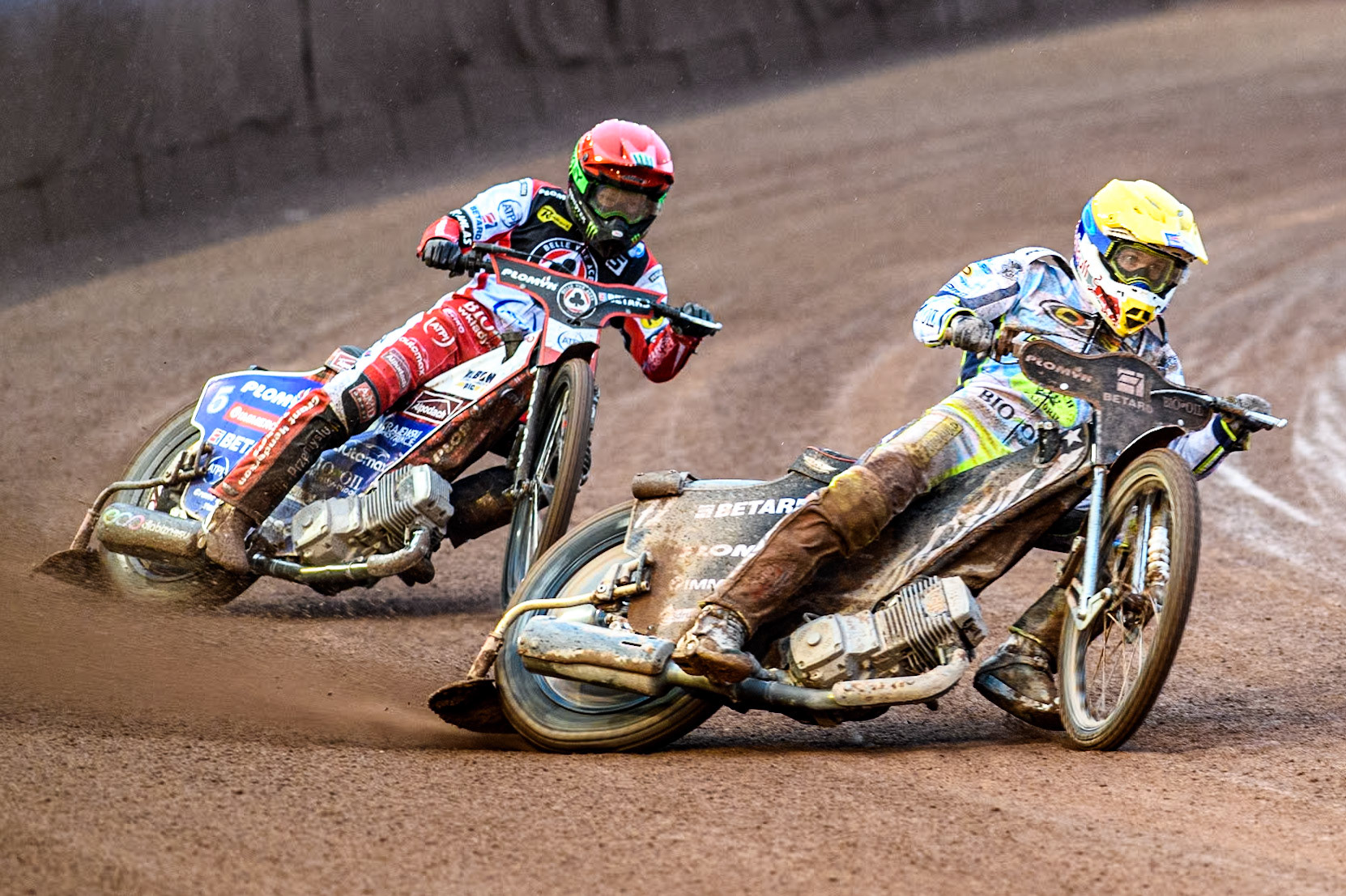 Oxford Spires' Maciej Janowski in Yellow leading Belle Vue Aces' Dan Bewley in Red during the Rowe Motor Oil Premiership match between Belle Vue Aces and Oxford Spires at the National Speedway Stadium, Manchester on Monday 13th May 2024. (Photo: Ian Charles | MI News)