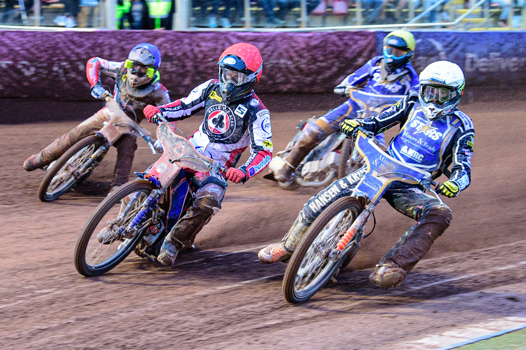 MANCHESTER, UK. MAY 16TH Niels-Kristian Iversen  (White) inside Brady Kurtz  (Red) with Norick Blödorn  (Blue) and Thomas Jorgensen  (Yellow) behind during the SGB Premiership match between Belle Vue Aces and King's Lynn Stars at the National Speedway Stadium, Manchester on Monday 16th May 2022. (Credit: Ian Charles | MI News)