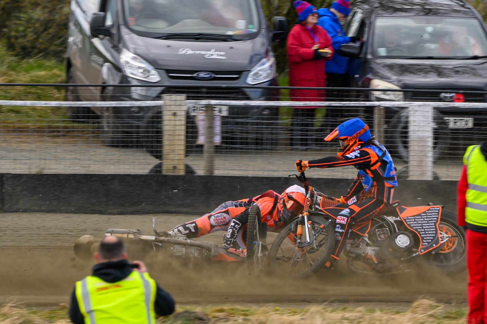 Connor Coles of NDL Nomads   in White fall and Jack Smith of Buxton Bulls   in Blue collides with him during the  Challenge match between Buxton Bulls and NDL Nomads at Hi-Edge Speedway, Buxton on Sunday 19th April 2026. (Photo: Ian Charles | MI News)