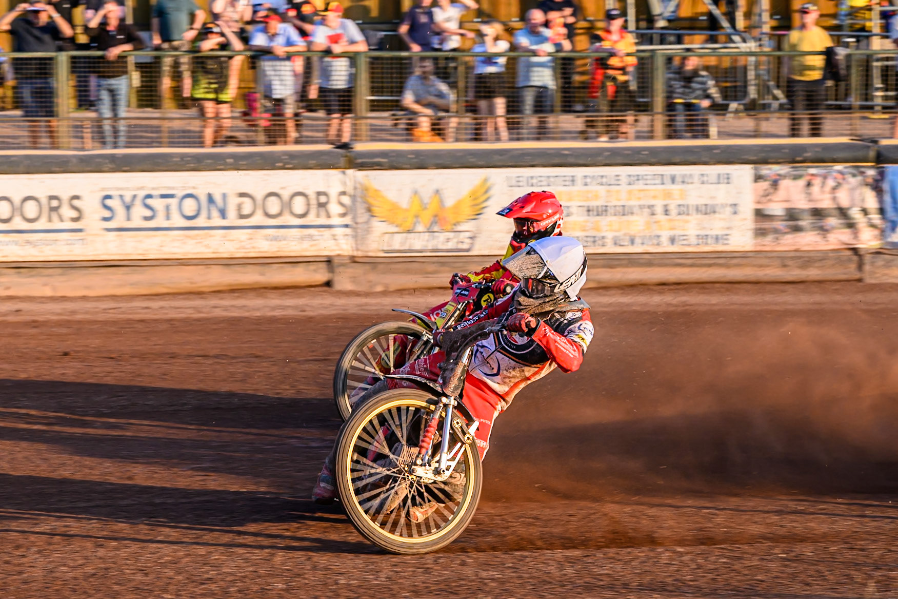 Belle Vue Aces' Norick Blodorn in White rides inside Leicester Lions' Max Fricke in Red during the Rowe Motor Oil Premiership match between Leicester Lions and Belle Vue Aces at the Hydroscand Arena, Leicester on Thursday 19th June 2025. (Photo: Ian Charles | MI News)