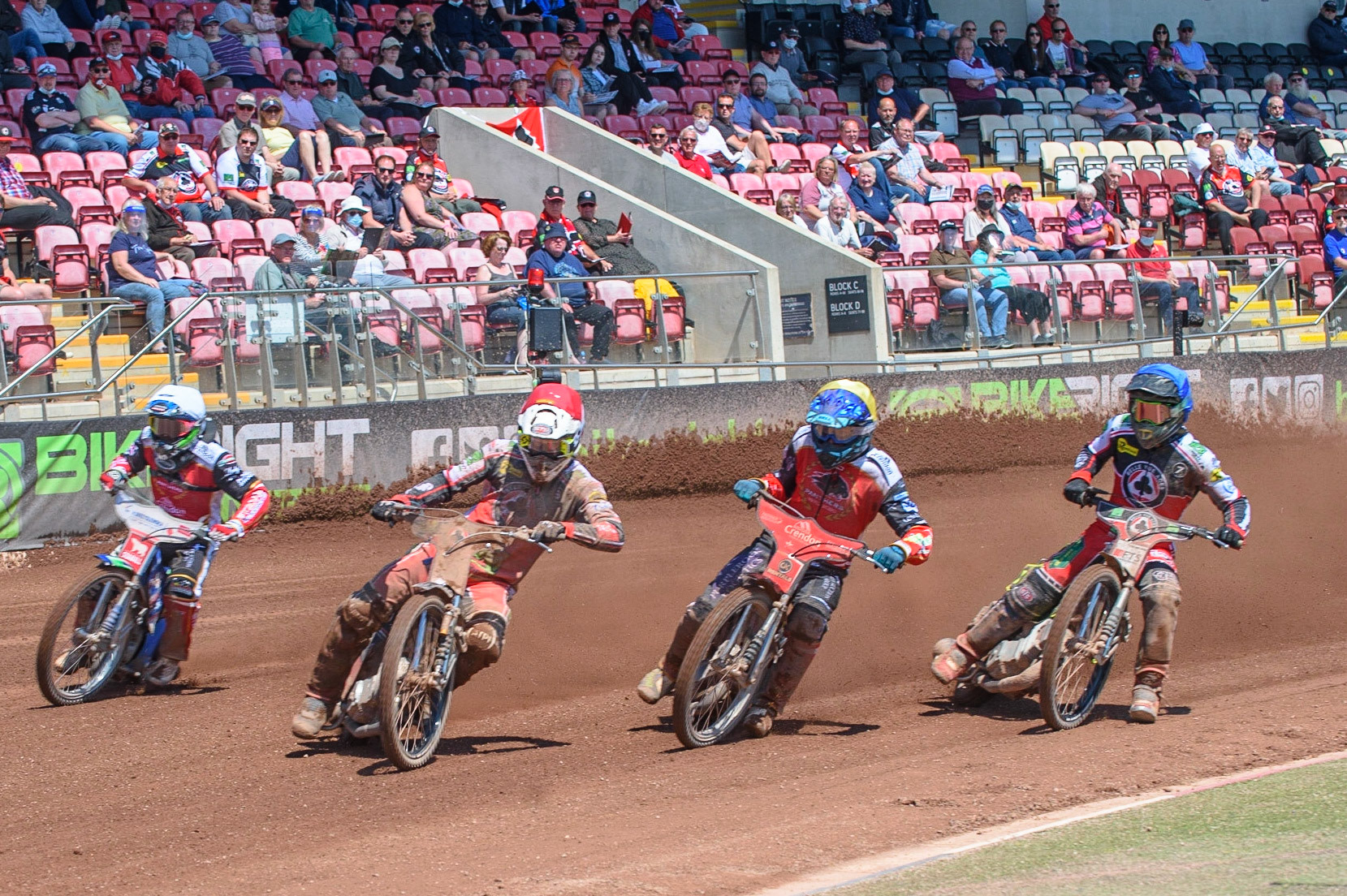 MANCHESTER, UK. MAY 31ST  Richie Worrall  (Red) leads Ulrich Ostergaard  (Yellow) Hans Andersen (White) and Jye Etheridge (Blue) to the first turn during the SGB Premiership match between Belle Vue Aces and Peterborough at the National Speedway Stadium, Manchester on Monday 31st May 2021. (Credit: Ian Charles | MI News)