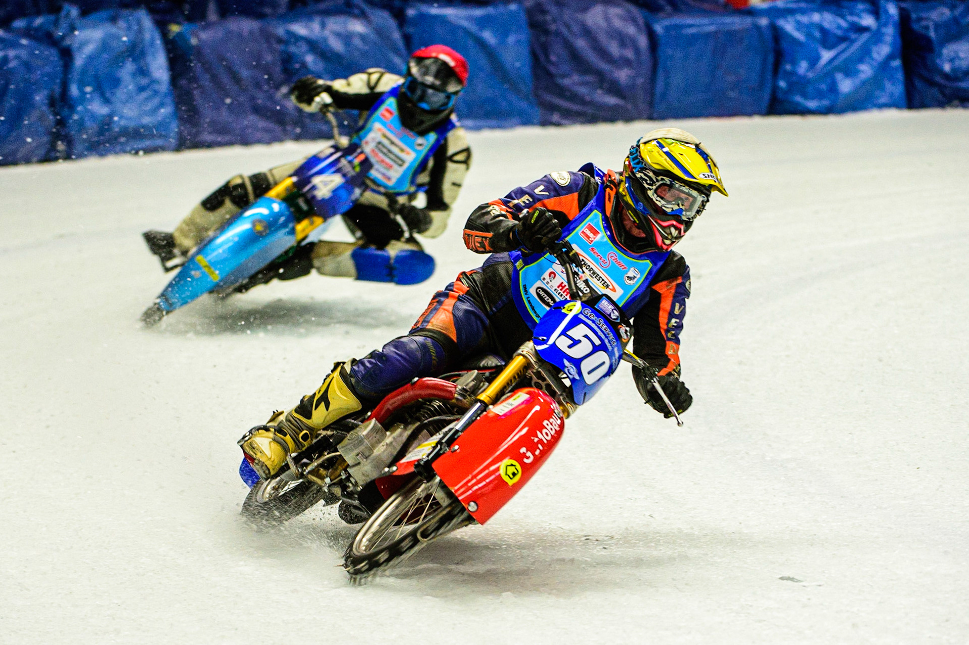 Josef Böhm (Yellow) leads Beat Dobler (Red) during the Race of Legends at the Max-Aicher-Arena, Inzell on Friday 17th March 2023. (Photo: Ian Charles | MI News)
