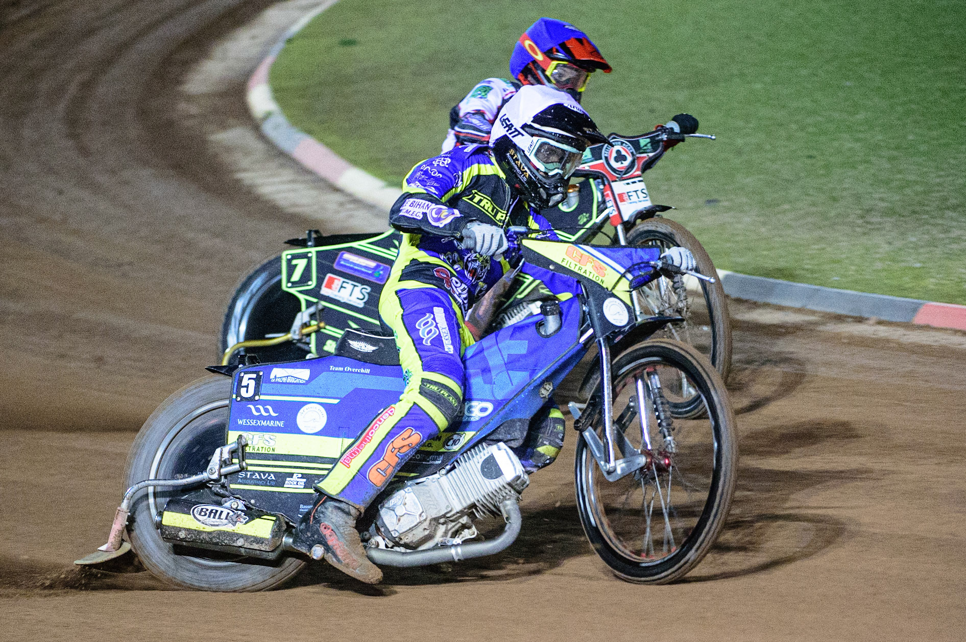 MANCHESTER, UK. OCT 7TH  Adam Ellis  (White) passes Jye Etheridge   (Blue) during the SGB Premiership Play off Semi-Final Second Leg between Belle Vue Aces and Sheffield Tigers at the National Speedway Stadium, Manchester on Thursday 7th October 2021. (Credit: Ian Charles | MI News)