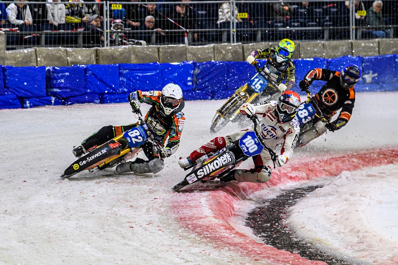Austria's Franz Zorn (100) in Red rides inside Germany's Markus Jell (82) in White with Netherland's Sebastian Reitsma (283) in Blue and Germany's Maximillian Neidermaier (16) in Yellow behind during the FIM Ice Speedway Gladiators World Championship Final 3 at Ice Rink Thialf, Heerenveen on Saturday 6th April 2024. (Photo: Ian Charles | MI News)