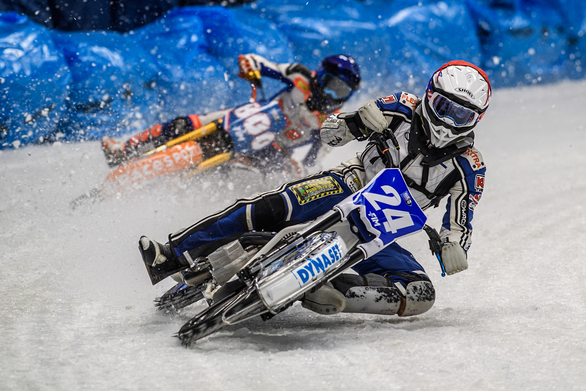 Max Koivula (24) of Finland in Red leading Jasper Iwema (800) of The Netherlands in Blue during the Ice Speedway Gladiators World Championship Final 2 at Max-Aicher-Arena, Inzell on Sunday 16th March 2025. (Photo: Ian Charles | MI News)