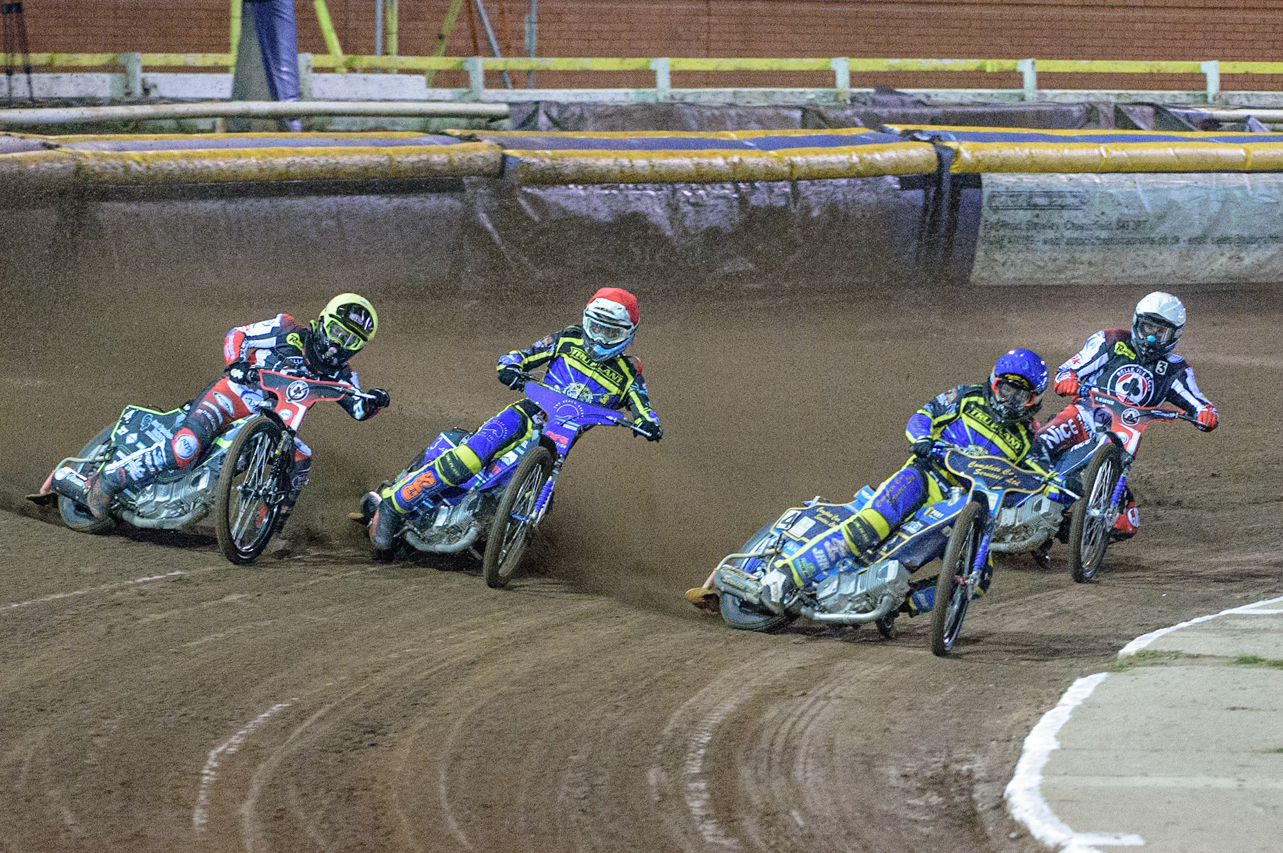 Kyle Howarth  (Blue) inside Adam Ellis  (Red) and Tom Brennan   (Yellow) with Matej Zagar (White) behind during the SGB Premiership Grand Final 2nd Leg between Sheffield Tigers and Belle Vue Aces at Owlerton Stadium, Sheffield on Thursday 13th October 2022. (Credit: Ian Charles | MI News)