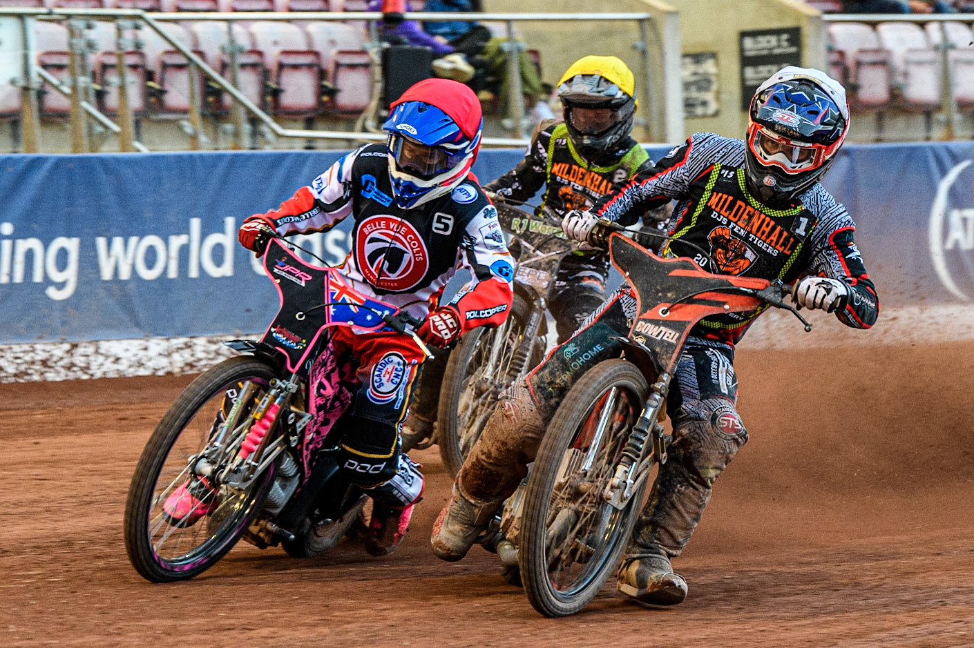 James Pearson (Red) outside Alfie Bowtell (White) with Josh Warren (Yellow) behind during the National Development League match between Belle Vue Colts and Mildenhall Fens Tigers at the National Speedway Stadium, Manchester on Friday 26th May 2023. (Photo: Ian Charles | MI News)
