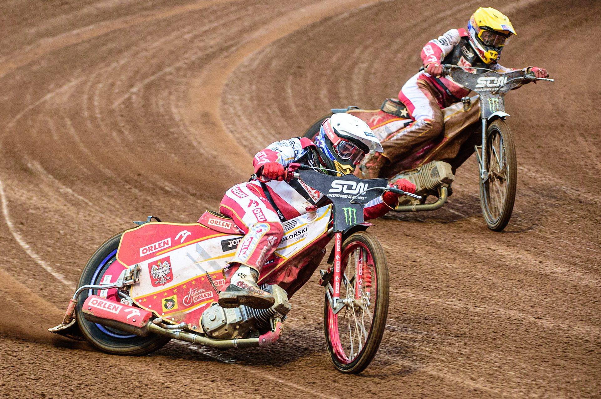 MANCHESTER, UK. OCT 17TH Bartosz Zmarzlik of Poland (White) leads team mate Maciej Janowski (Yellow) during the Monster Energy FIM Speedway of Nations at the National Speedway Stadium, Manchester on Sunday  17th October 2021. (Credit: Ian Charles | MI News)