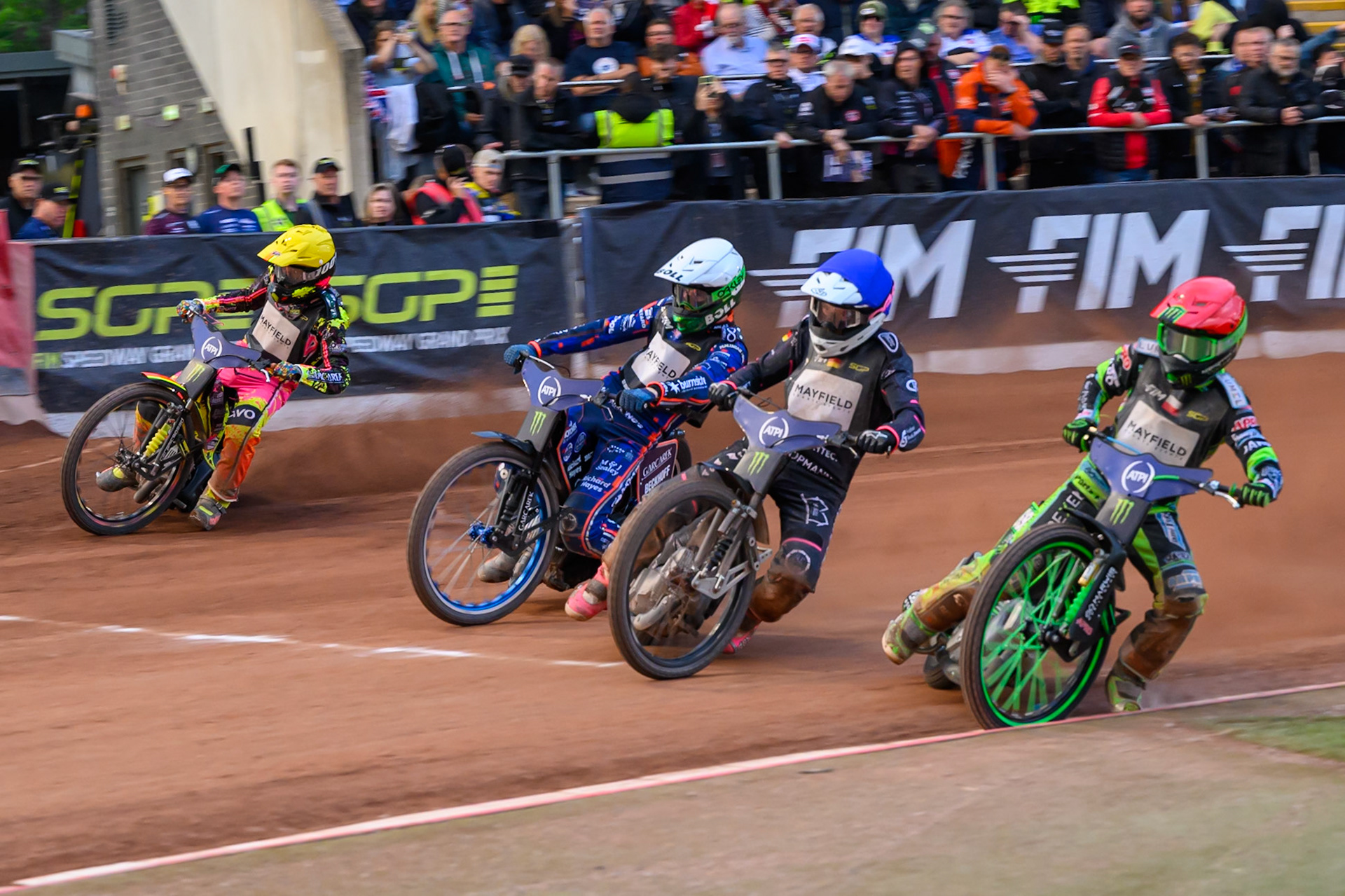 (L to R) Michael Jepsen Jensen (52) of Denmark in Yellow, Brady Kurtz (101) of Australia in White, Kai Huckenbeck (744) of Germany in Blue and Patryk Dudek (692) of Poland in Red during the ATPI  FIM Speedway GP of Manchester at the National Speedway Stadium, Manchester on Saturday 6th June 2026. (Photo: Ian Charles | MI News)
