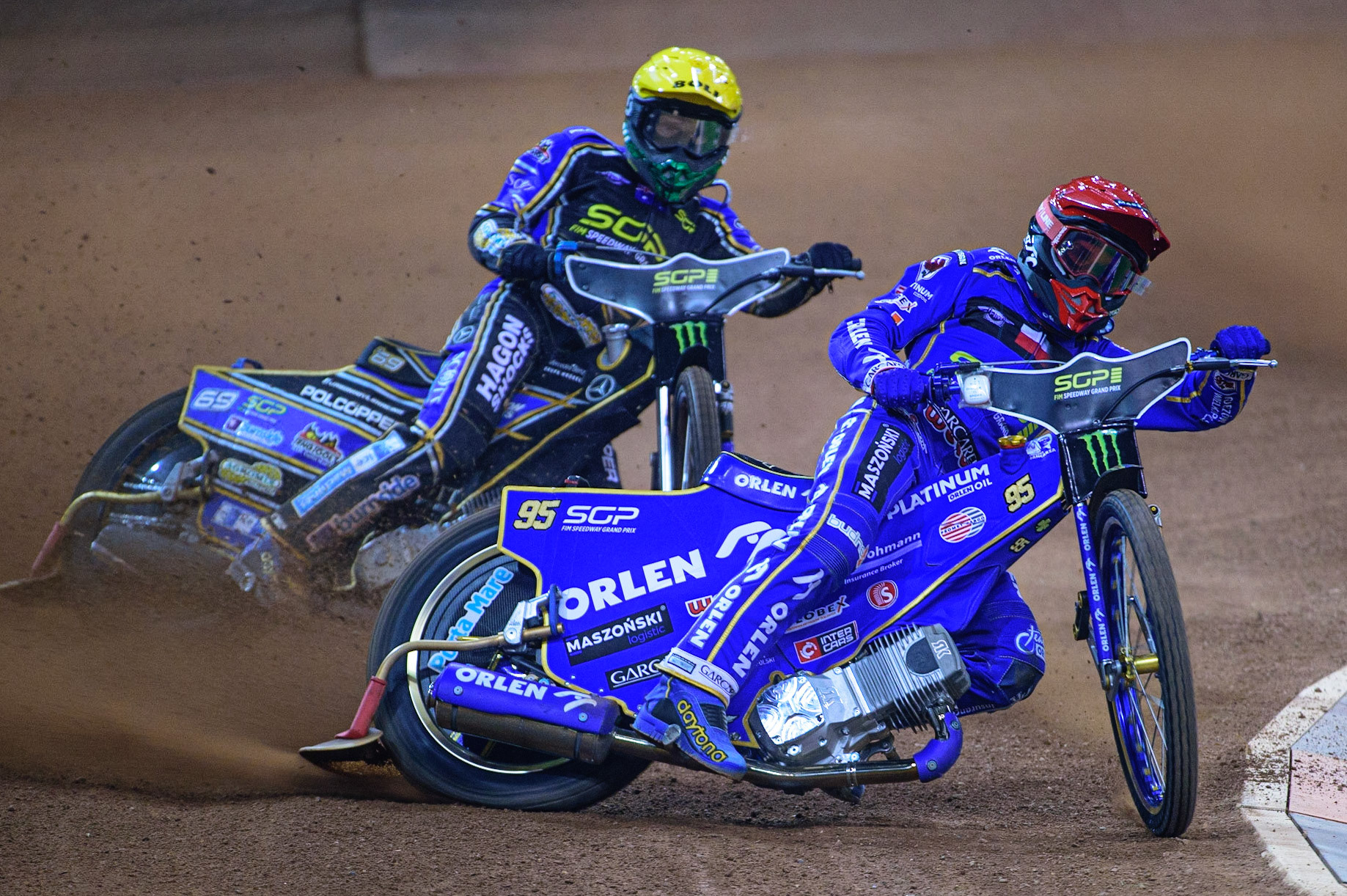 Bartosz Zmarzlik (95) (Red) leads Jason Doyle (69) (Yellow) during the FIM  Speedway Grand Prix of Great Britain at the Principality Stadium, Cardiff on Saturday 13th August 2022. (Credit: Ian Charles | MI News