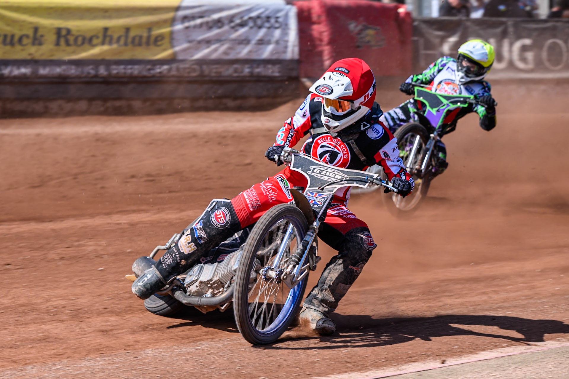 Jack Shimelt of Belle Vue Colts   in Red leading Kai Ward of Middlesborough Tigers  in Yellow during the WSRA National Development League match between Belle Vue Colts and Middlesbrough Tigers at the National Speedway Stadium, Manchester on Sunday 10th August 2025. (Photo: Mark Fletcher | MI News)