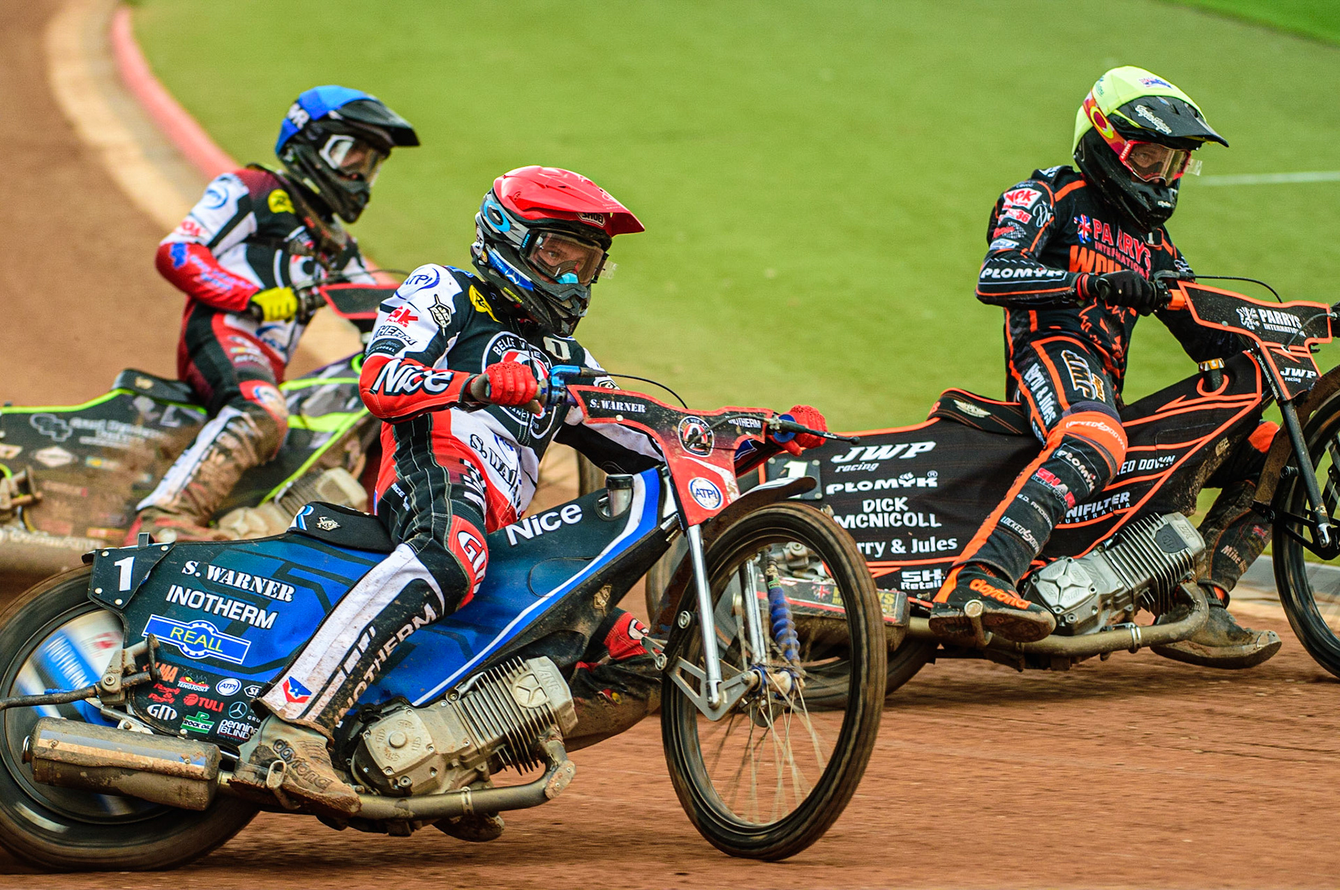 Matej Zagar  (Red) outside Tom Brennan  (Blue) and Sam Masters (Yellow) during the SGB Premiership match between Belle Vue Aces and Wolverhampton Wolves at the National Speedway Stadium, Manchester on Monday 29th August 2022. (Credit: Ian Charles | MI News)