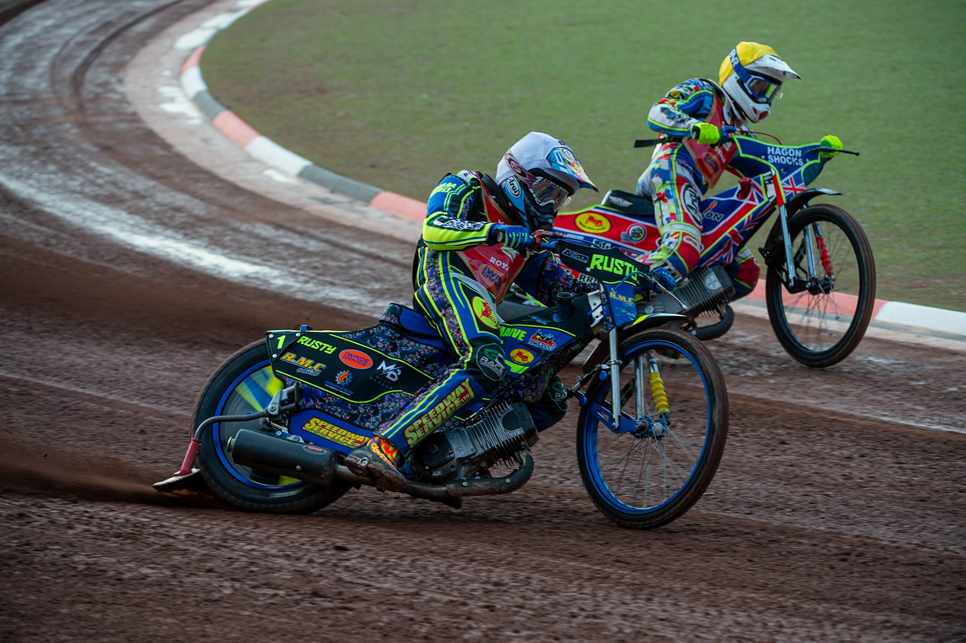 MANCHESTER, UK. JULY 2ND  Kent Iwade Garage Royals riders Ryan Kinsley  (White) and Jake Mulford  (Yellow) on their way to maximum heat pointsduring the National Development League match between Belle Vue Colts and Kent Royals at the National Speedway Stadium, Manchester on Friday 2nd July 2021. (Credit: Ian Charles | MI News)
