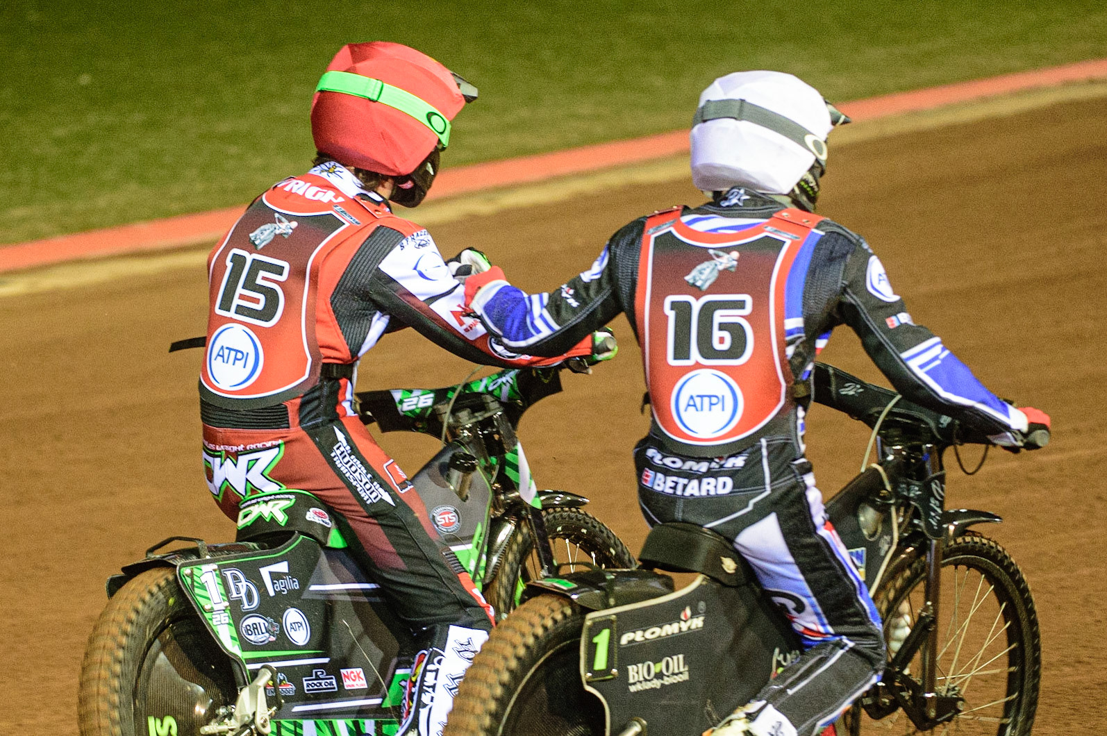 MANCHESTER, UK. MAR 21ST. Charles Wright (Red) and Dan Bewley (White) congratulate each other after the heat during the ATPI Peter Craven Memorial Trophy at the National Speedway Stadium, Manchester on Monday 21st March 2022. (Credit: Ian Charles | MI News)