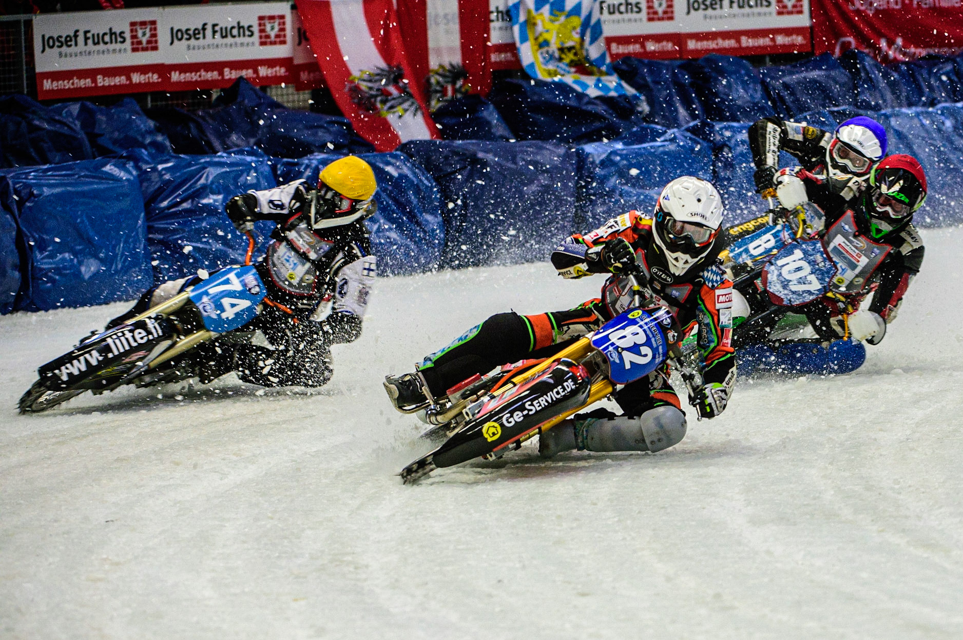 Markus Jell (82) (White) leads Mats Järf (74) (Yellow) Andrej Divis (107) (Red) and Jimmy Olsen (81) (Blue) during the Ice Speedway Gladiators World Championship Final 2 at Max-Aicher-Arena, Inzell, Germany on Sunday 19th March 2023. (Photo: Ian Charles | MI News)