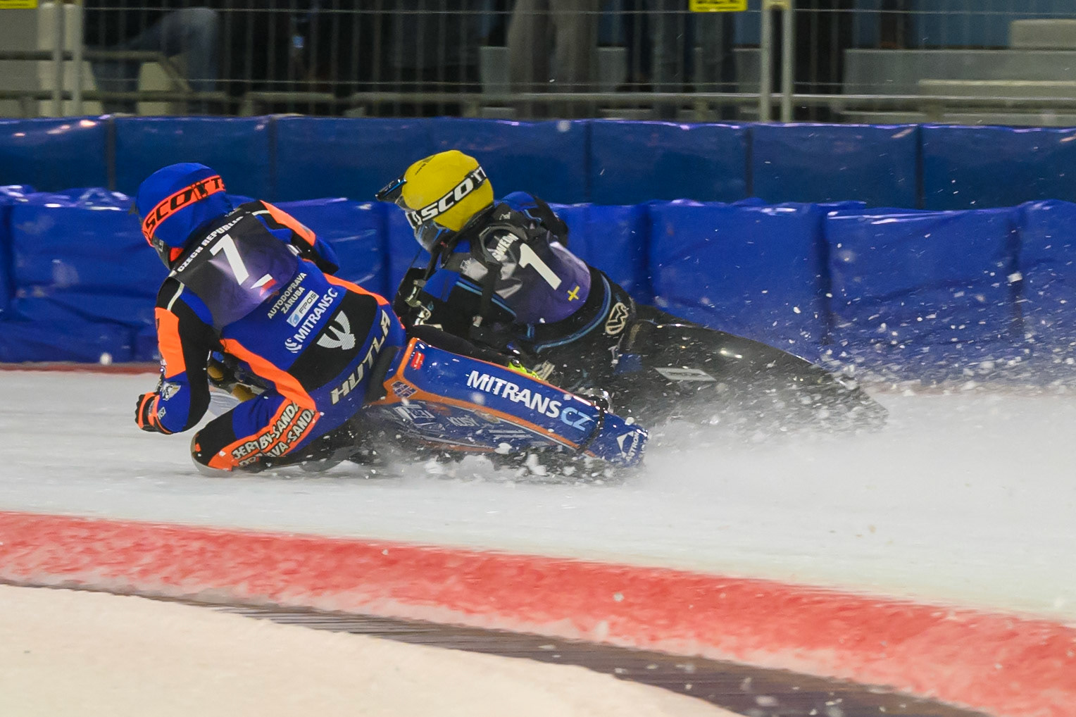 Lukáš Hutla (7) of Czechia in Blue rides inside Niclas Svensson (1) of Sweden  in Yellow during the FIM Ice Speedway Of Nations at Ice Rink Thialf, Heerenveen on Sunday 12th April 2026. (Photo: Ian Charles | MI News)